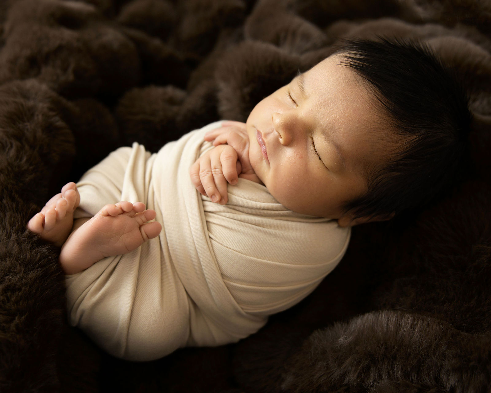 Studio newborn session photographed by Leah Louviere Photography