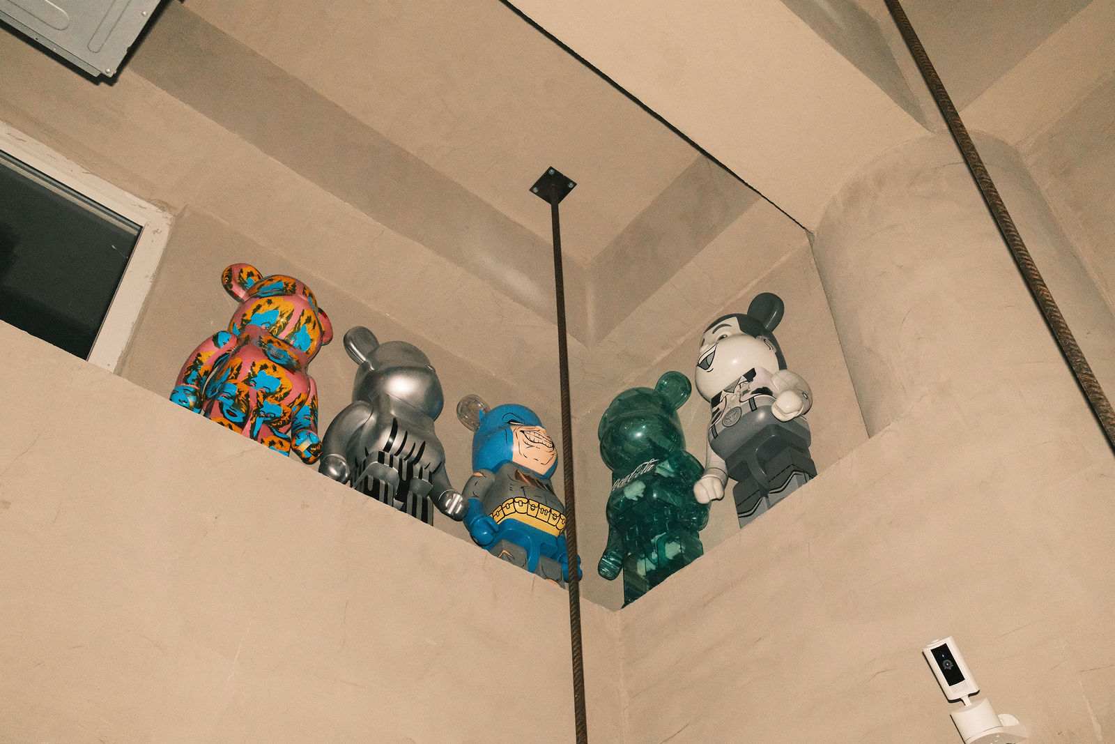 Art figures arranged on a shelf at Heat Depot