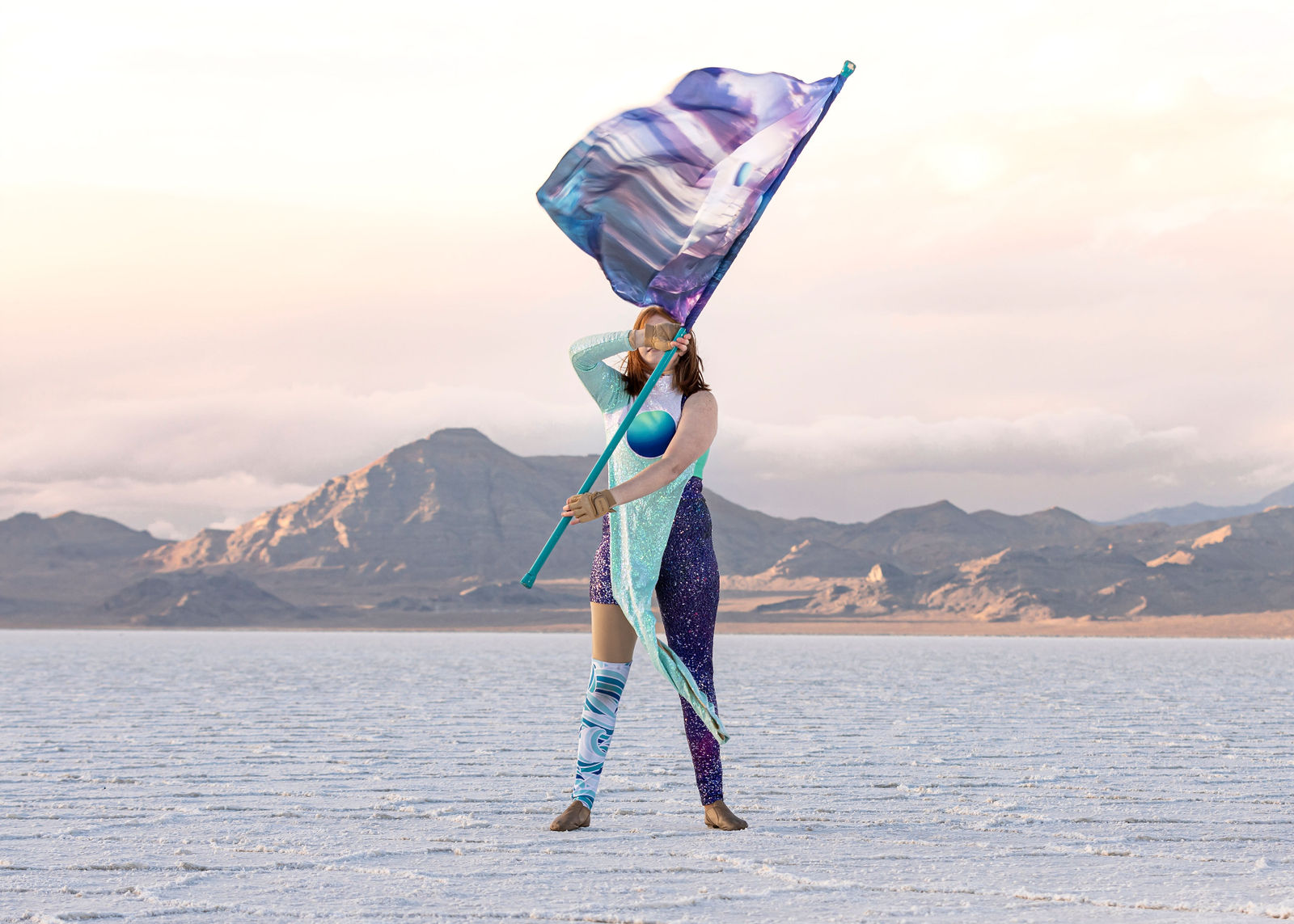 Aerial view of Bonneville Salt Flats senior session in Utah with wide open landscape
