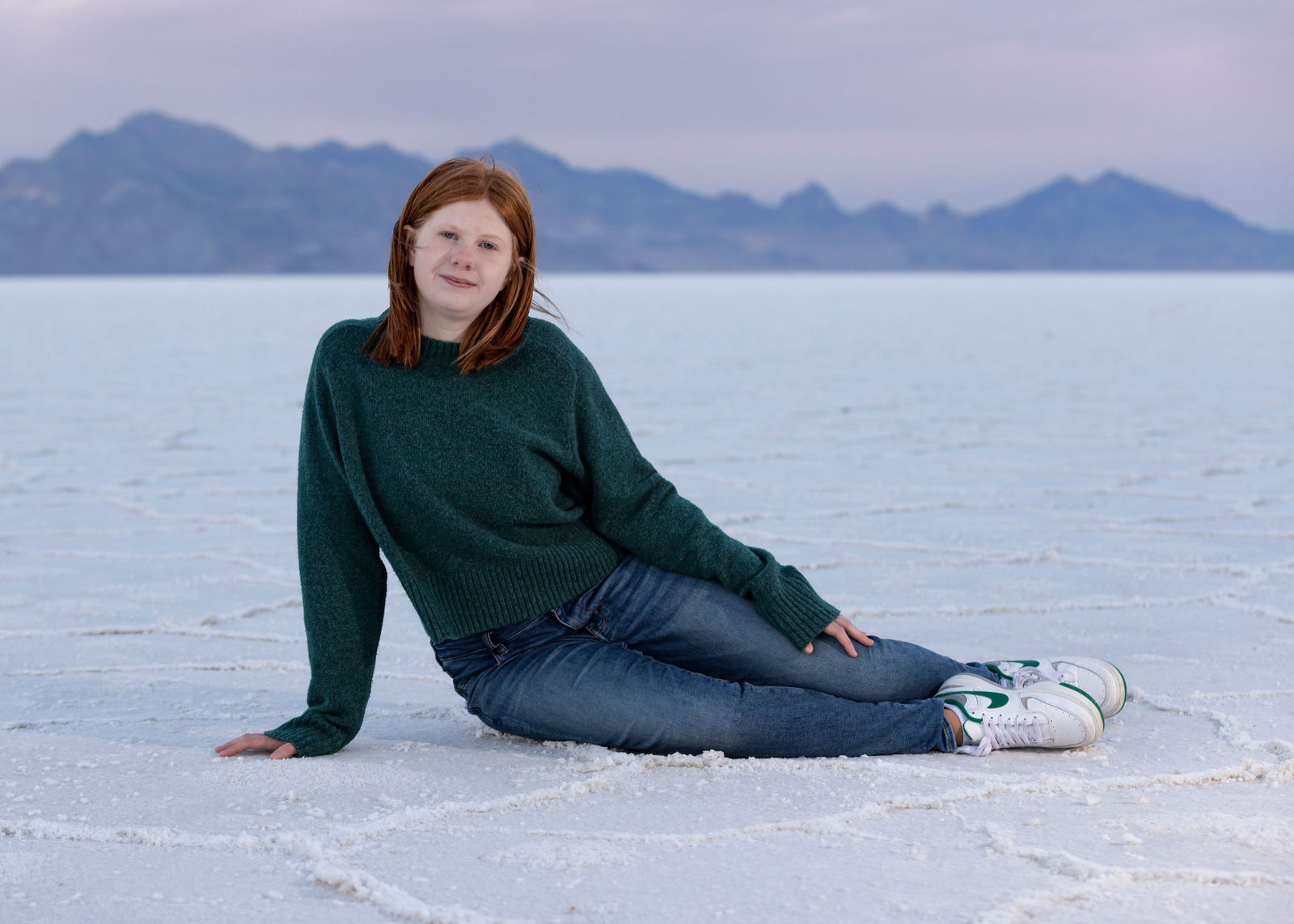 Color guard senior portrait at Bonneville Salt Flats with movement and soft light