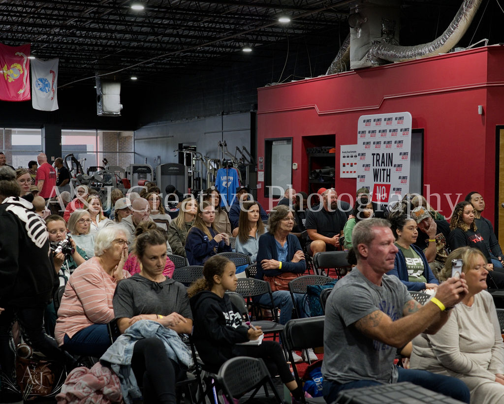 Spectators watching the Halloween Havoc powerlifting meet
