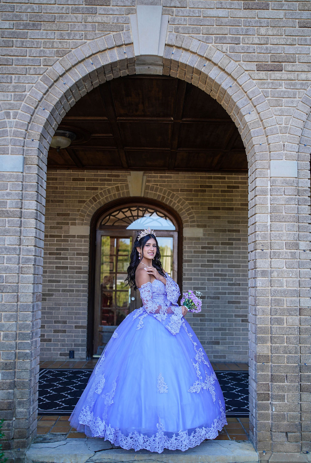 Candid laughter during the quinceañera celebration