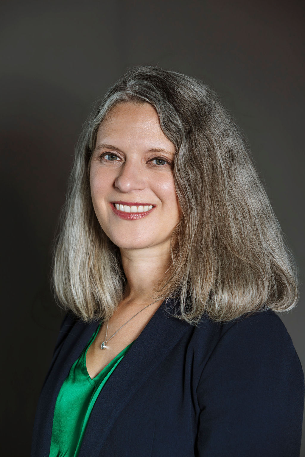 Headshot booth Nashville portrait with soft lighting and a confident, friendly expression