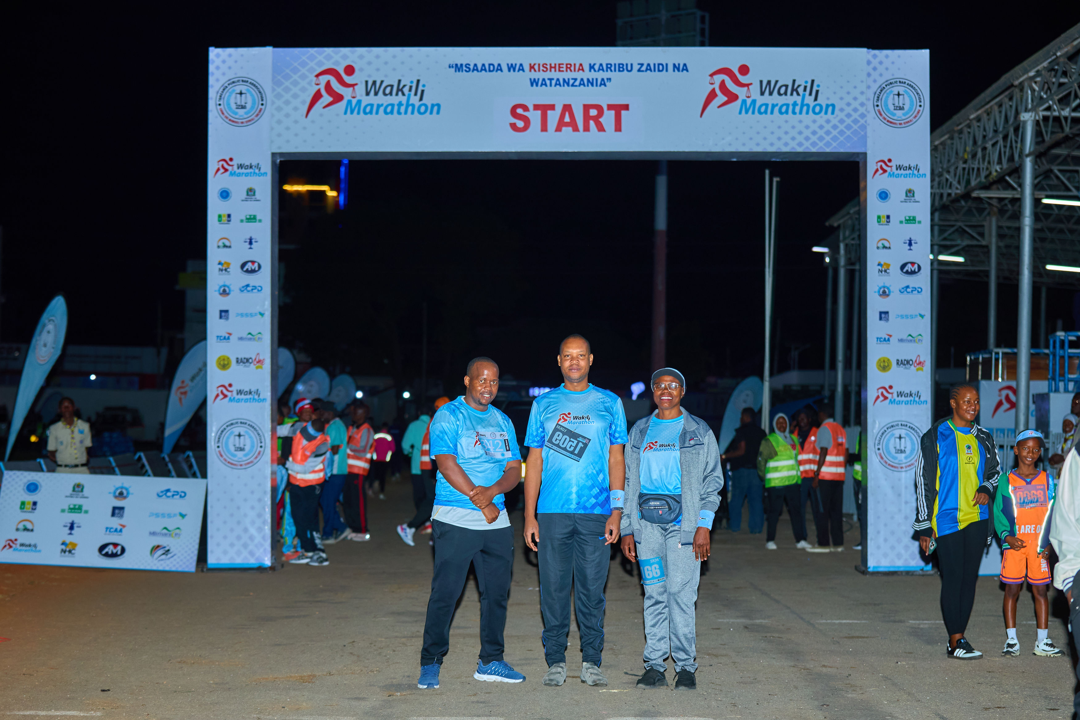 Wakili Marathon participants at the branded start arch