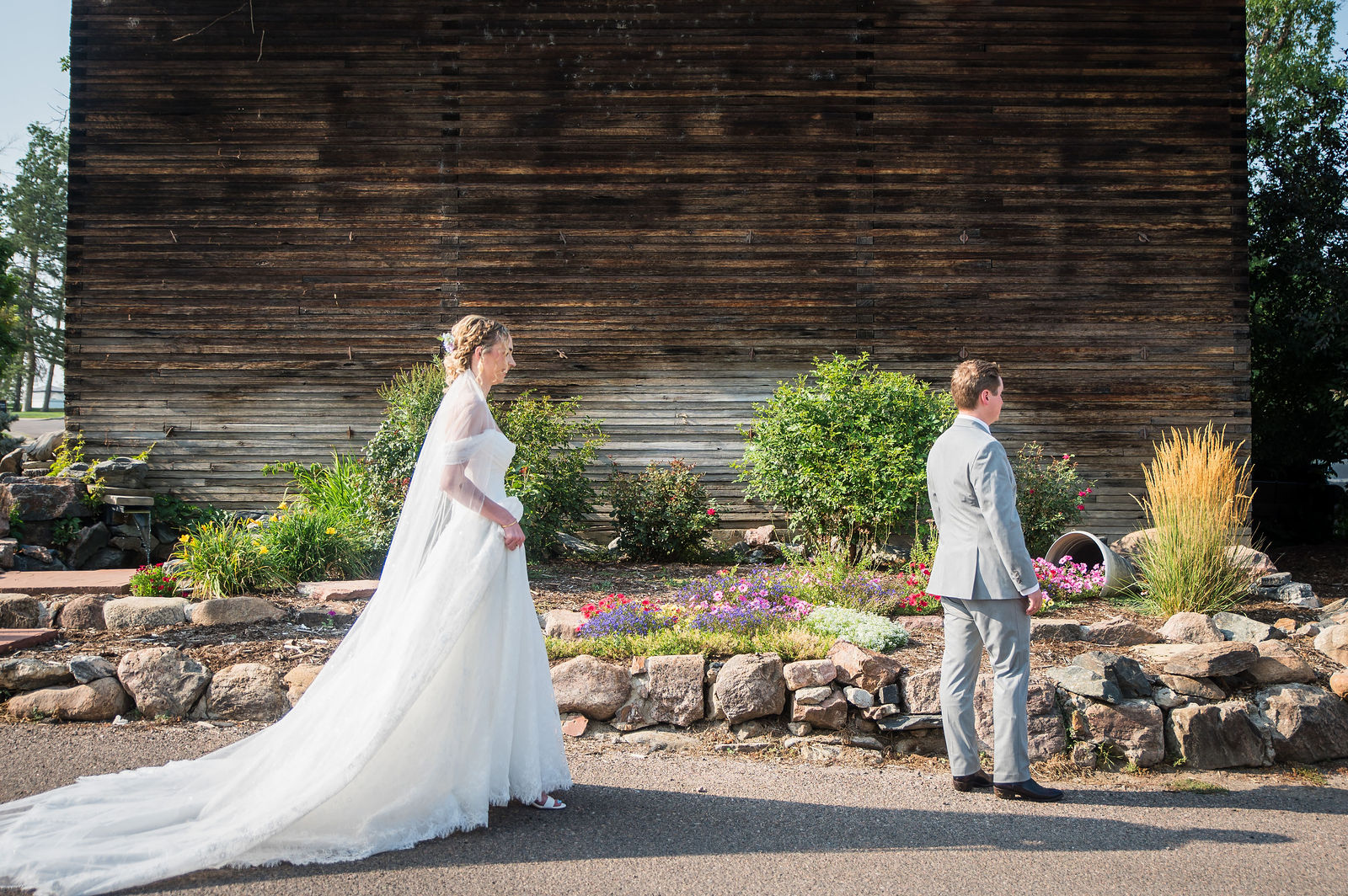 Bride with her dress spread out at a Colorado wedding venue