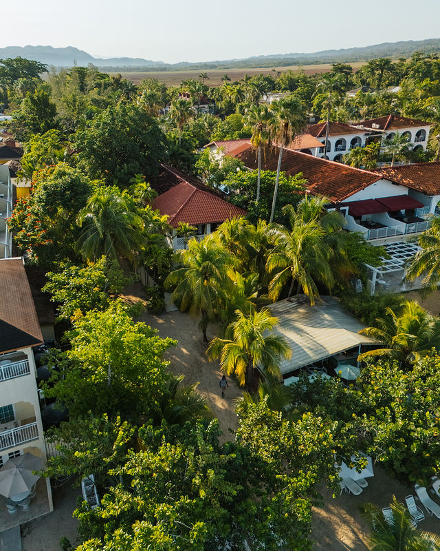 water activities and beach scene at Idle Awhile Negril Jamaica with paddleboards