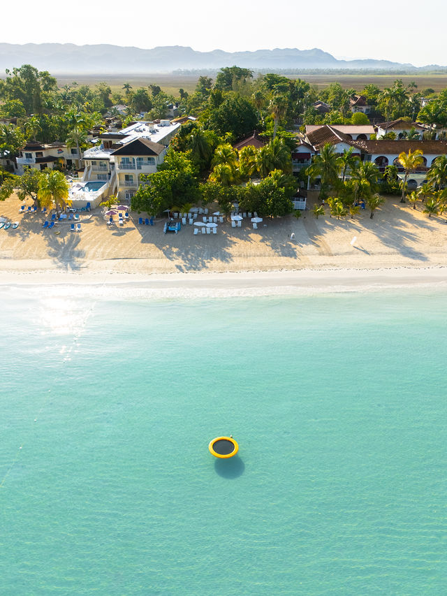 beach lounging area at Idle Awhile resort Negril Jamaica with Seven Mile Beach