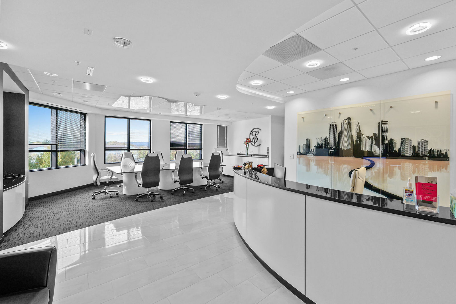 Modern conference room with city skyline artwork