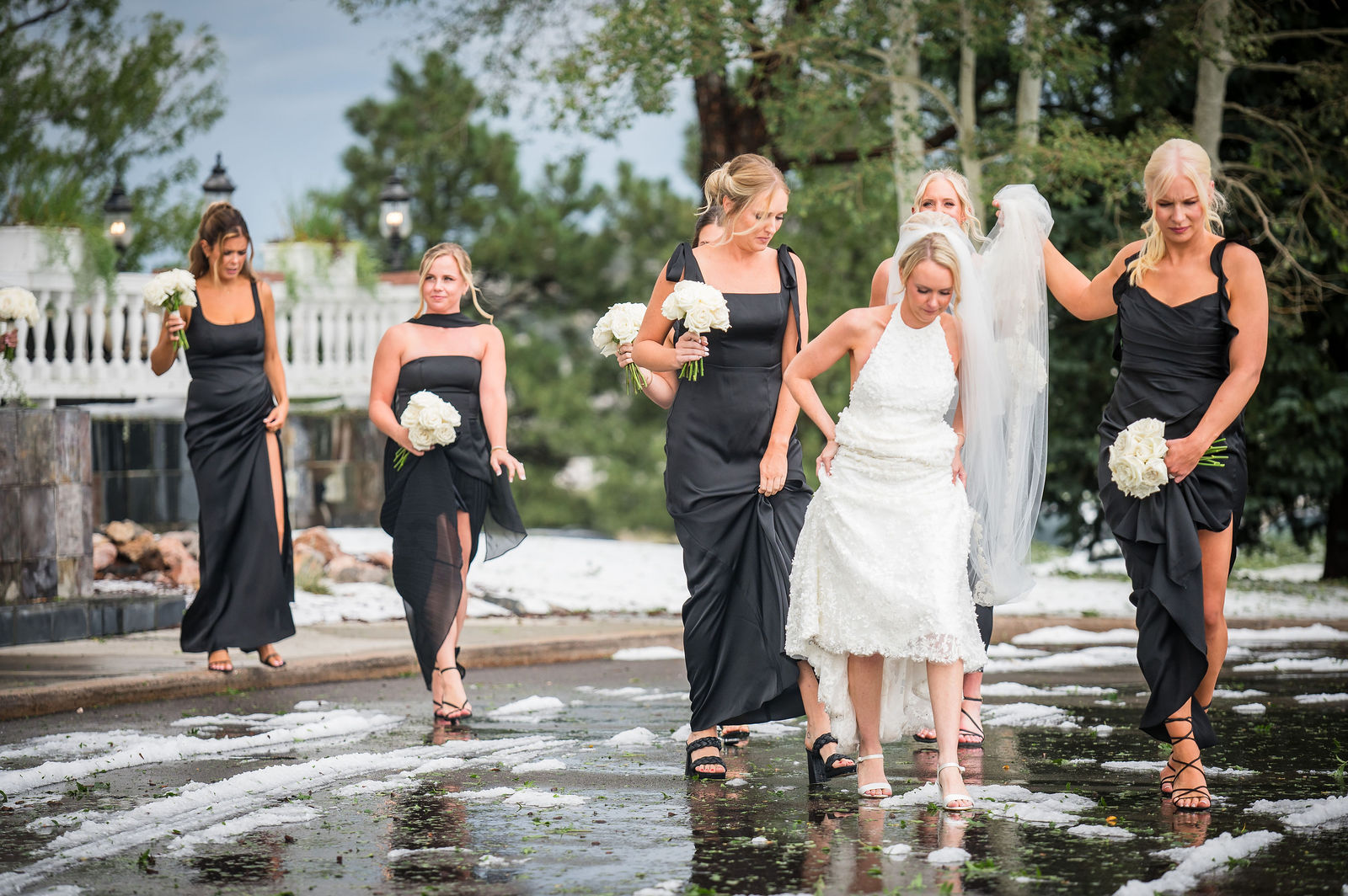 Bridesmaids walking with the bride at The Manor House