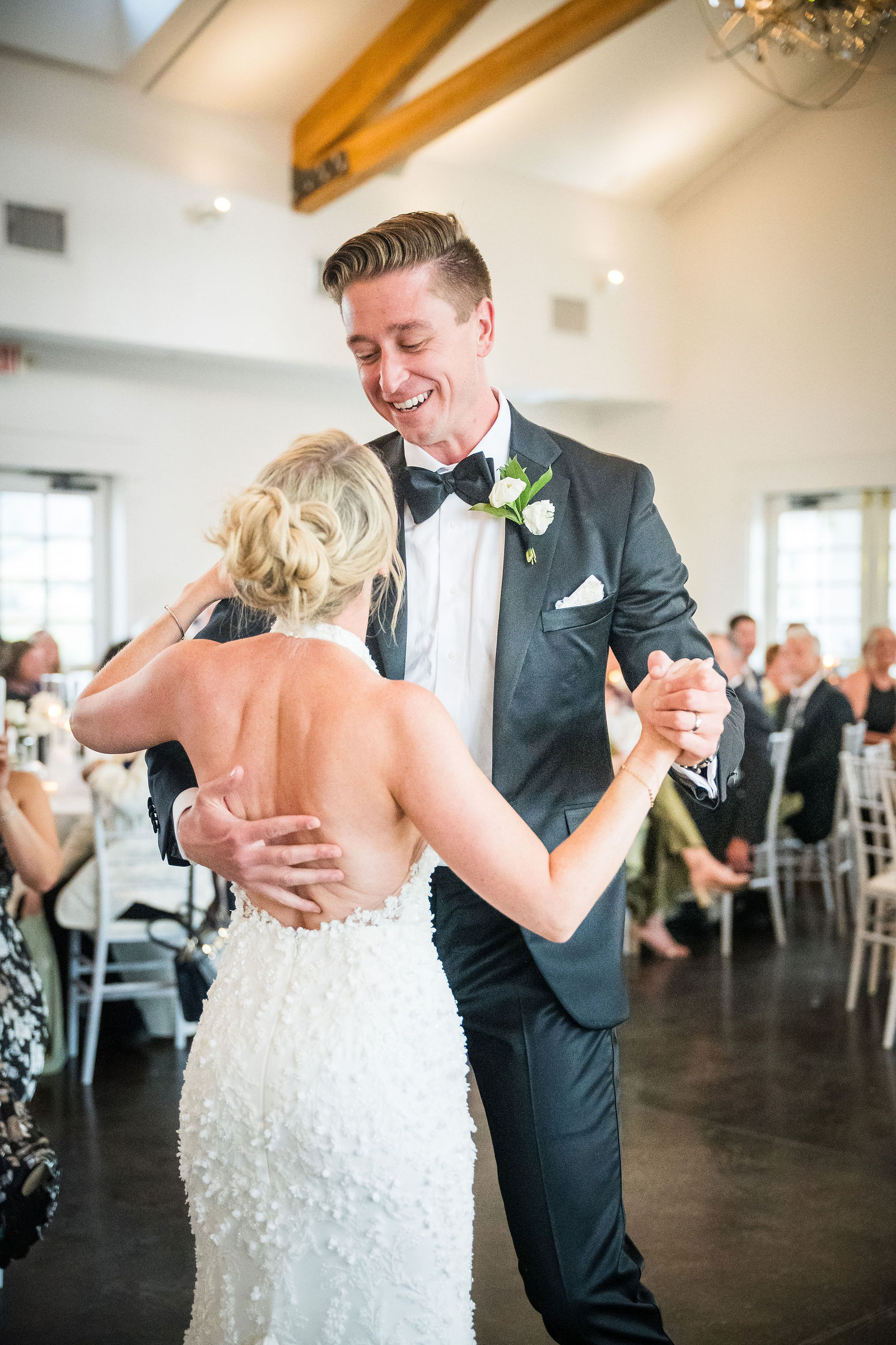 Groom lifting the bride during their first dance at a Manor House wedding