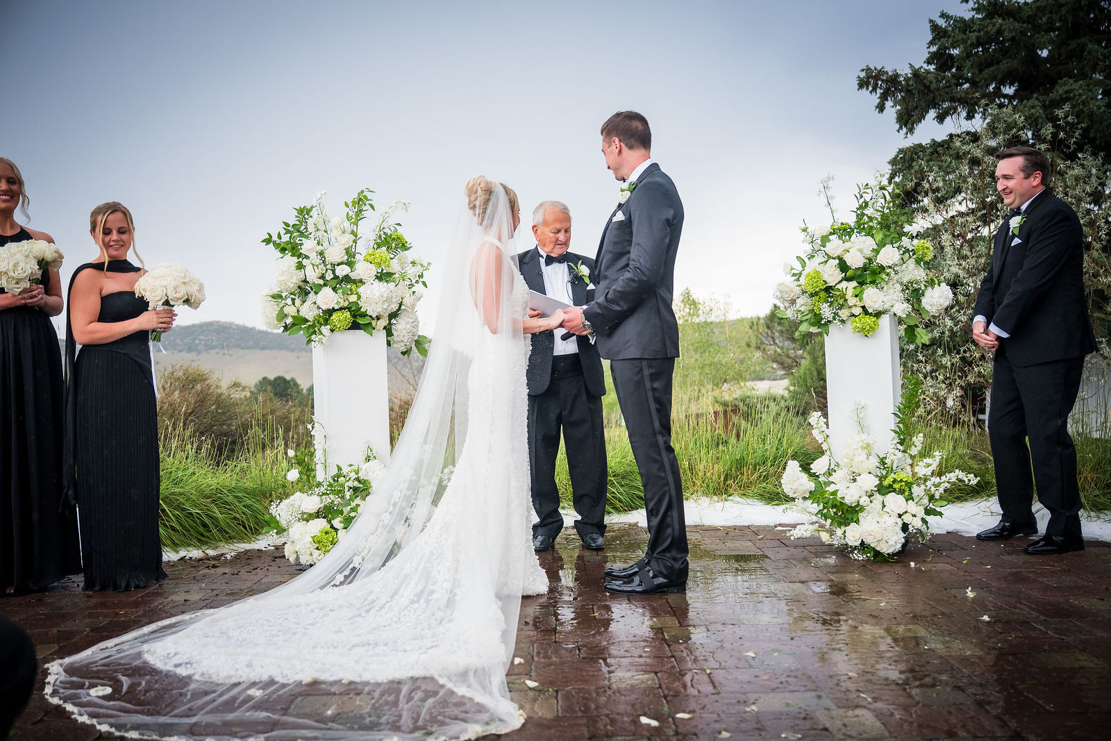 Exchanging vows at a Manor House wedding in Littleton Colorado