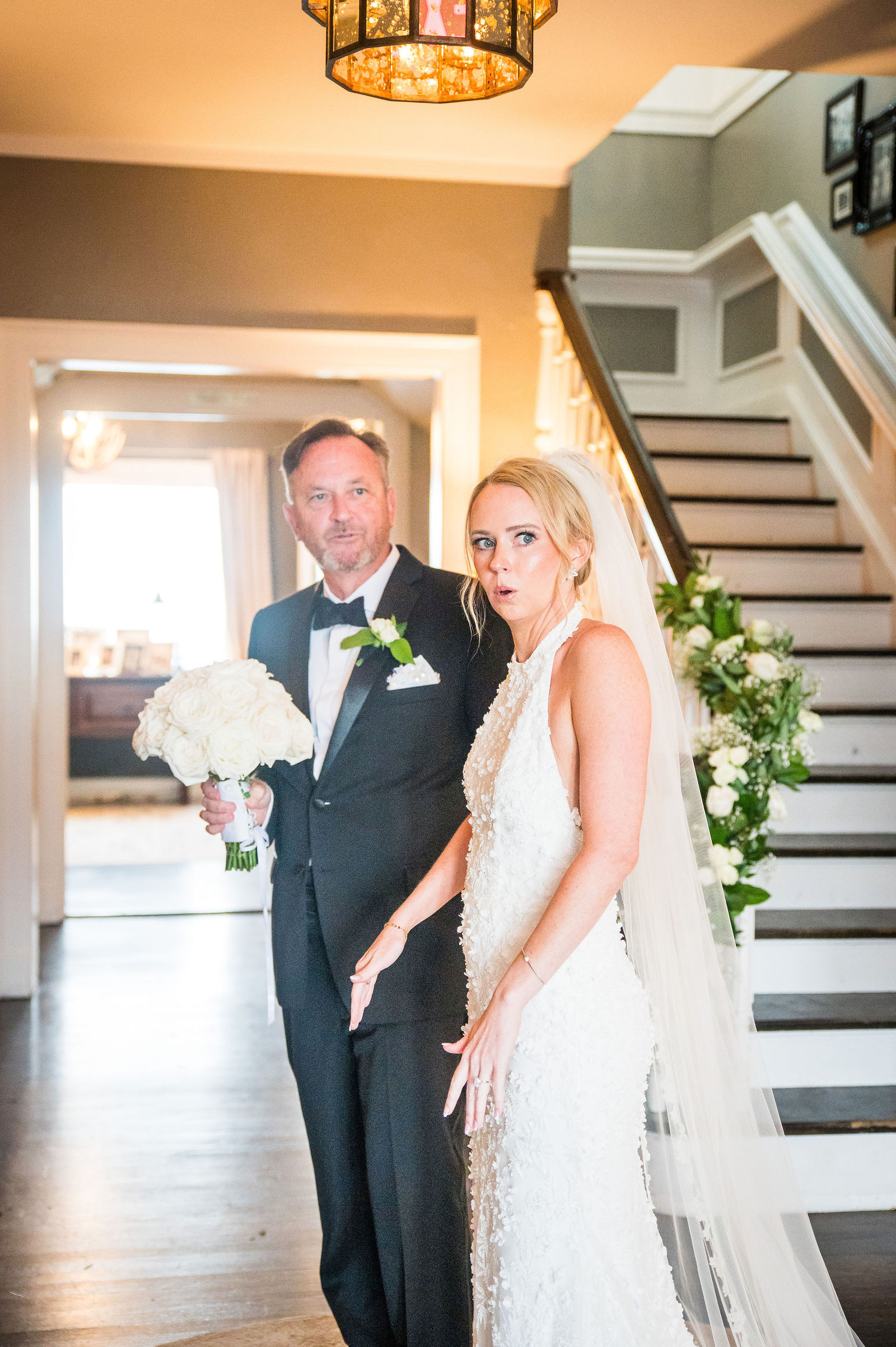 Wedding ceremony on the staircase at The Manor House in Littleton, Colorado