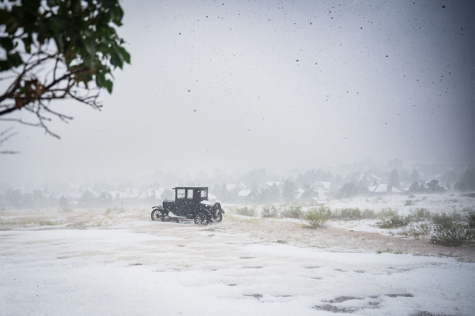 The Manor House in Littleton Colorado under August hail