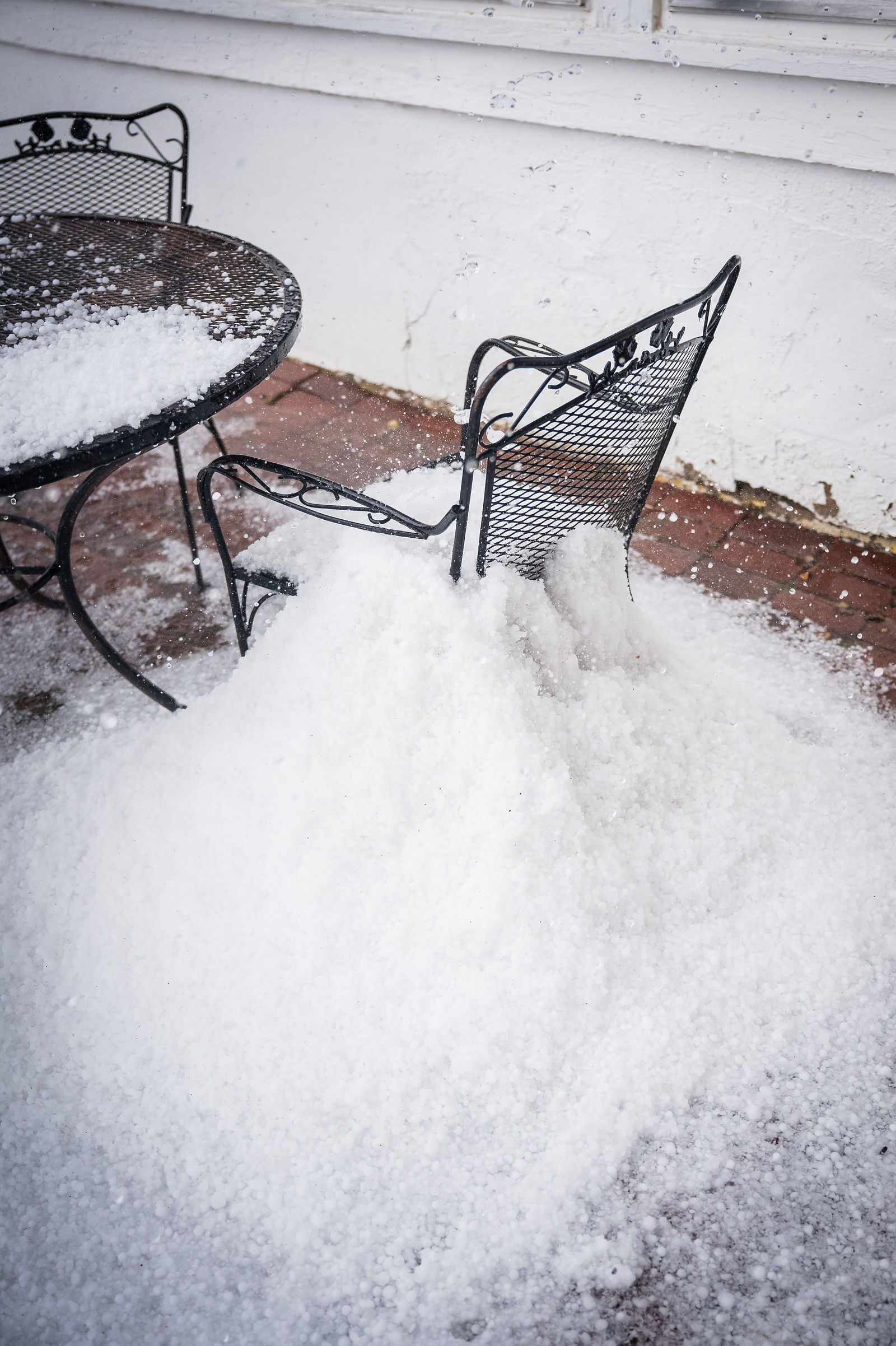Hail piled on a chair at The Manor House before an August wedding