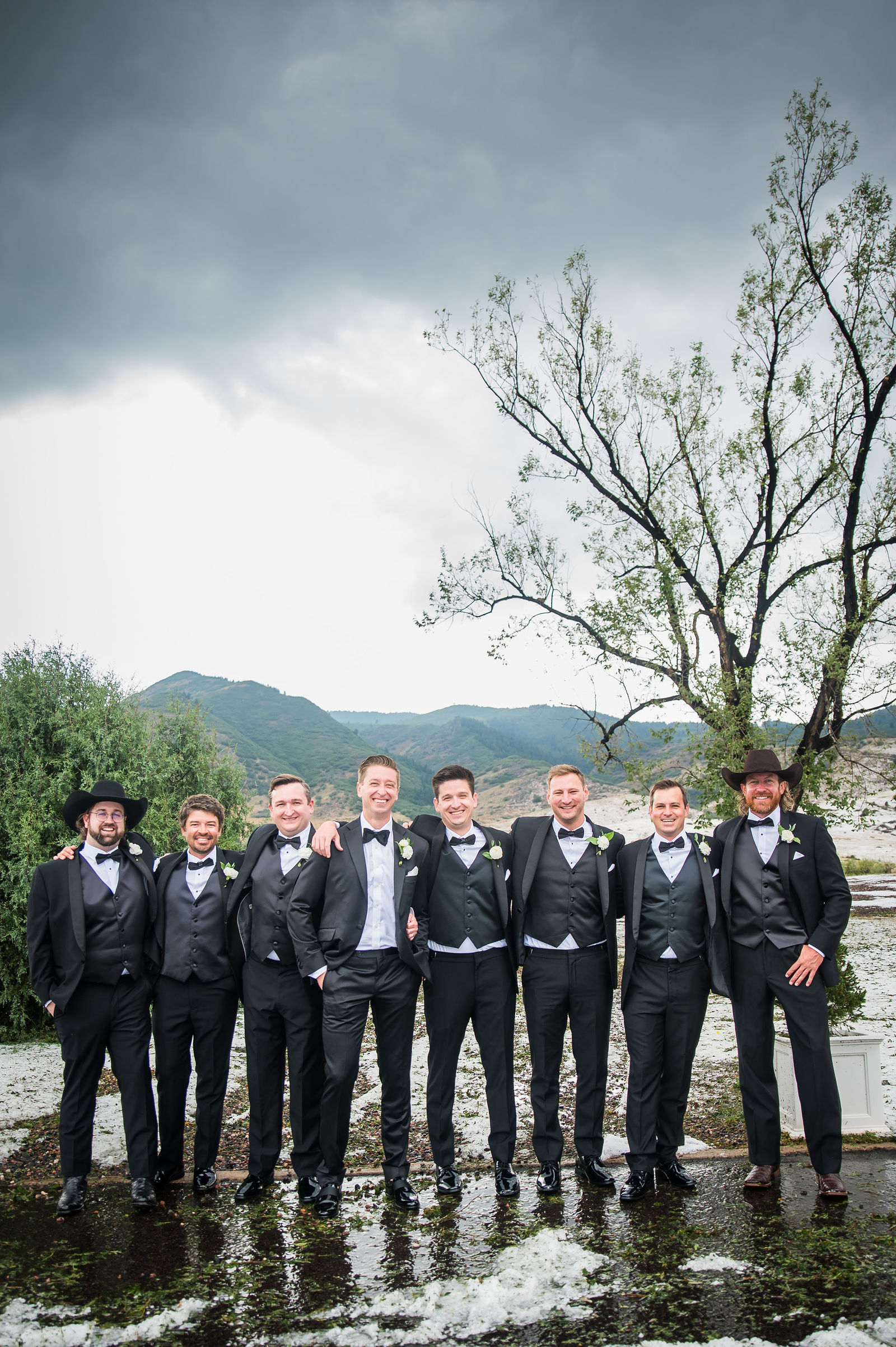 Groomsmen with mountain views at a Colorado wedding