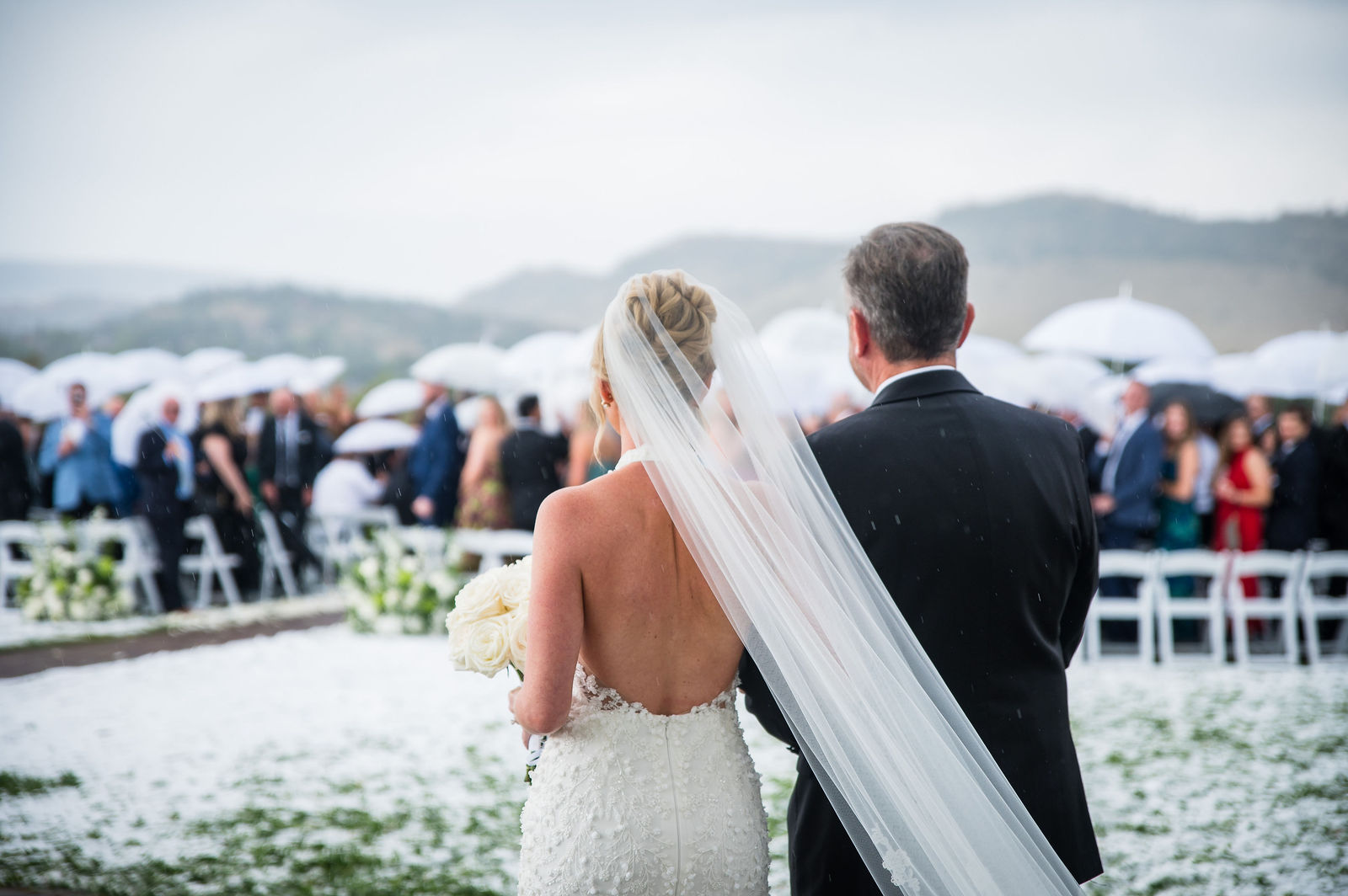 Wedding ceremony with mountain views at The Manor House