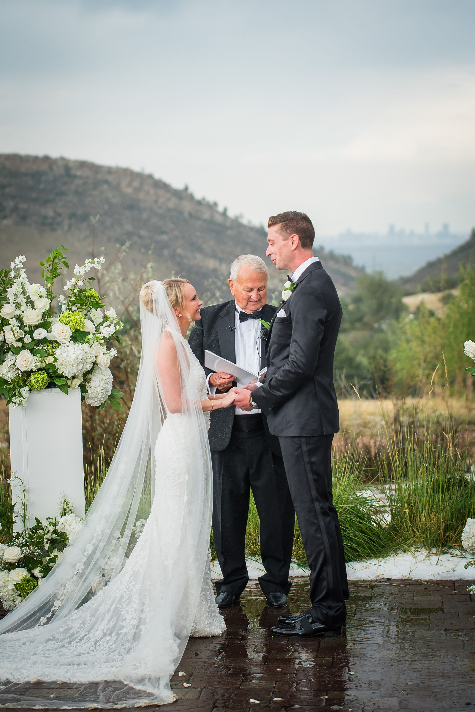 Exchanging rings during the ceremony at The Manor House