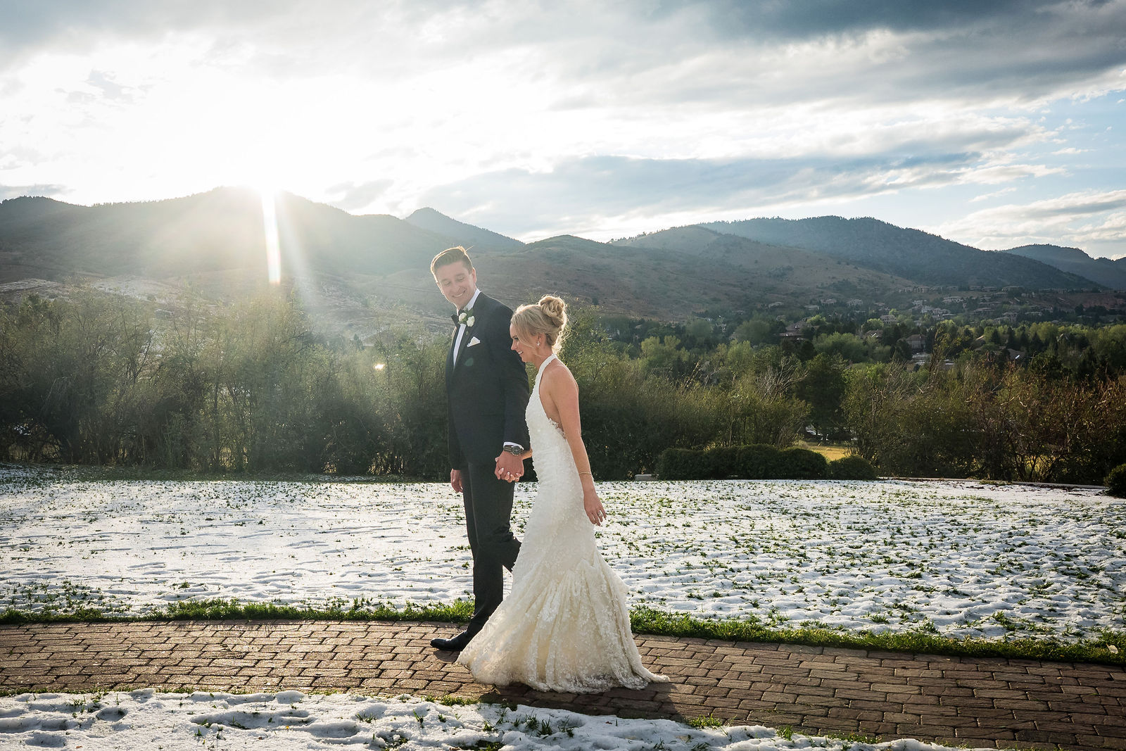 Wedding portrait on the hail covered grounds at The Manor House in Littleton, Colorado