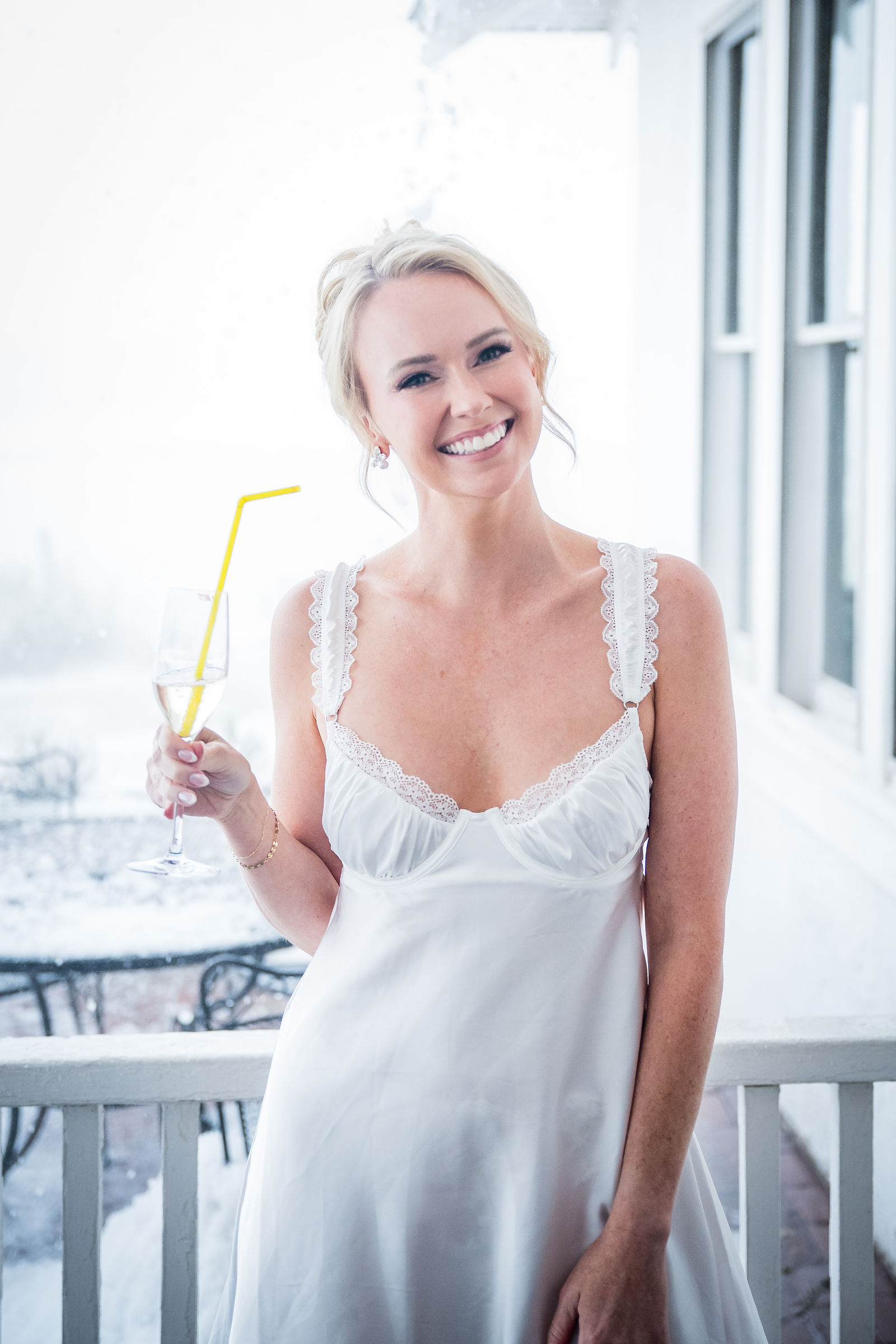 Mother of the bride fastening the necklace at a Colorado wedding