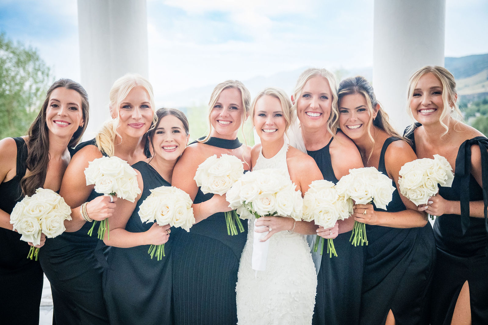Bridesmaids with bouquets at The Manor House in Littleton, Colorado