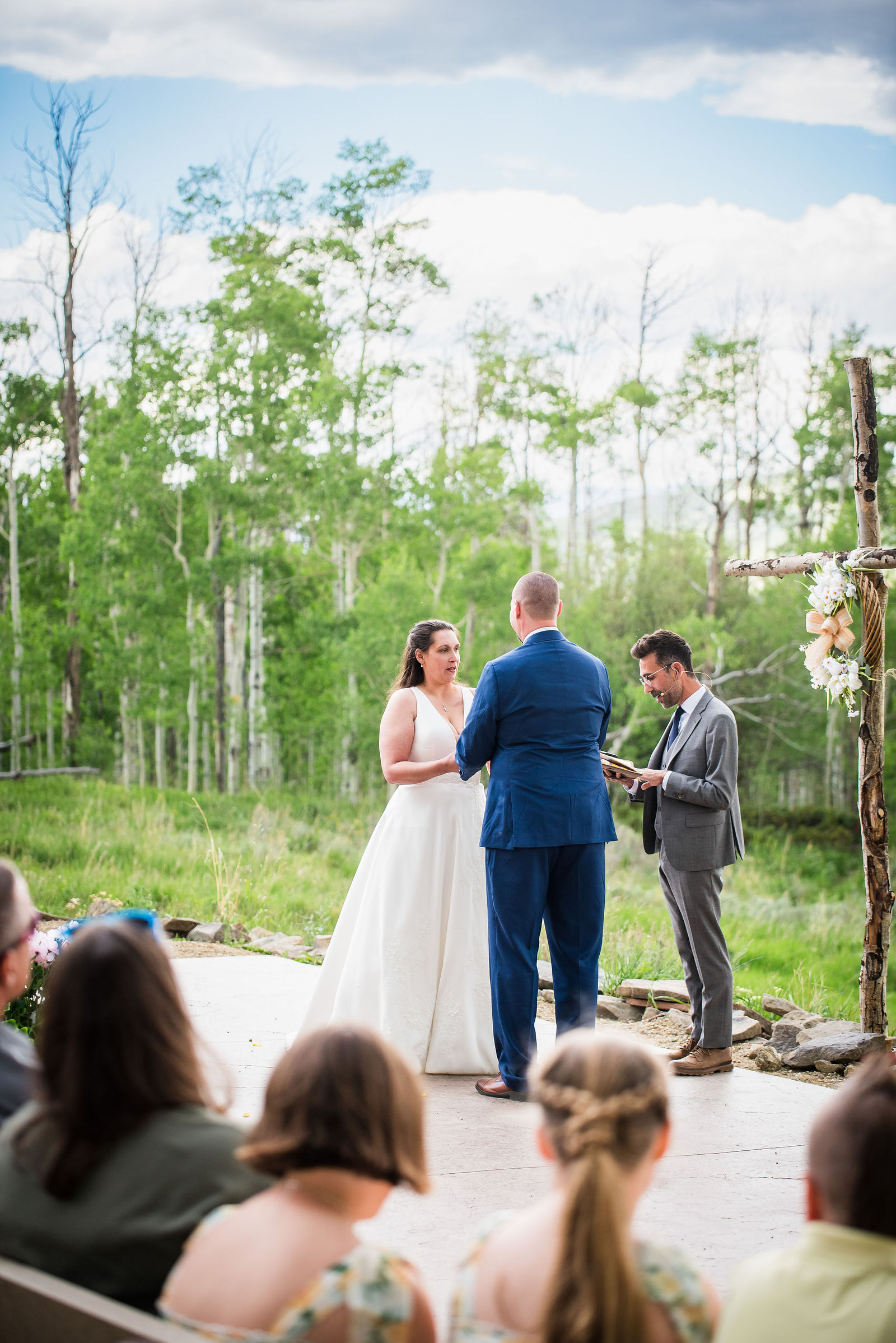 Outdoor ceremony among the aspens at Headwaters Center in Winter Park, Colorado