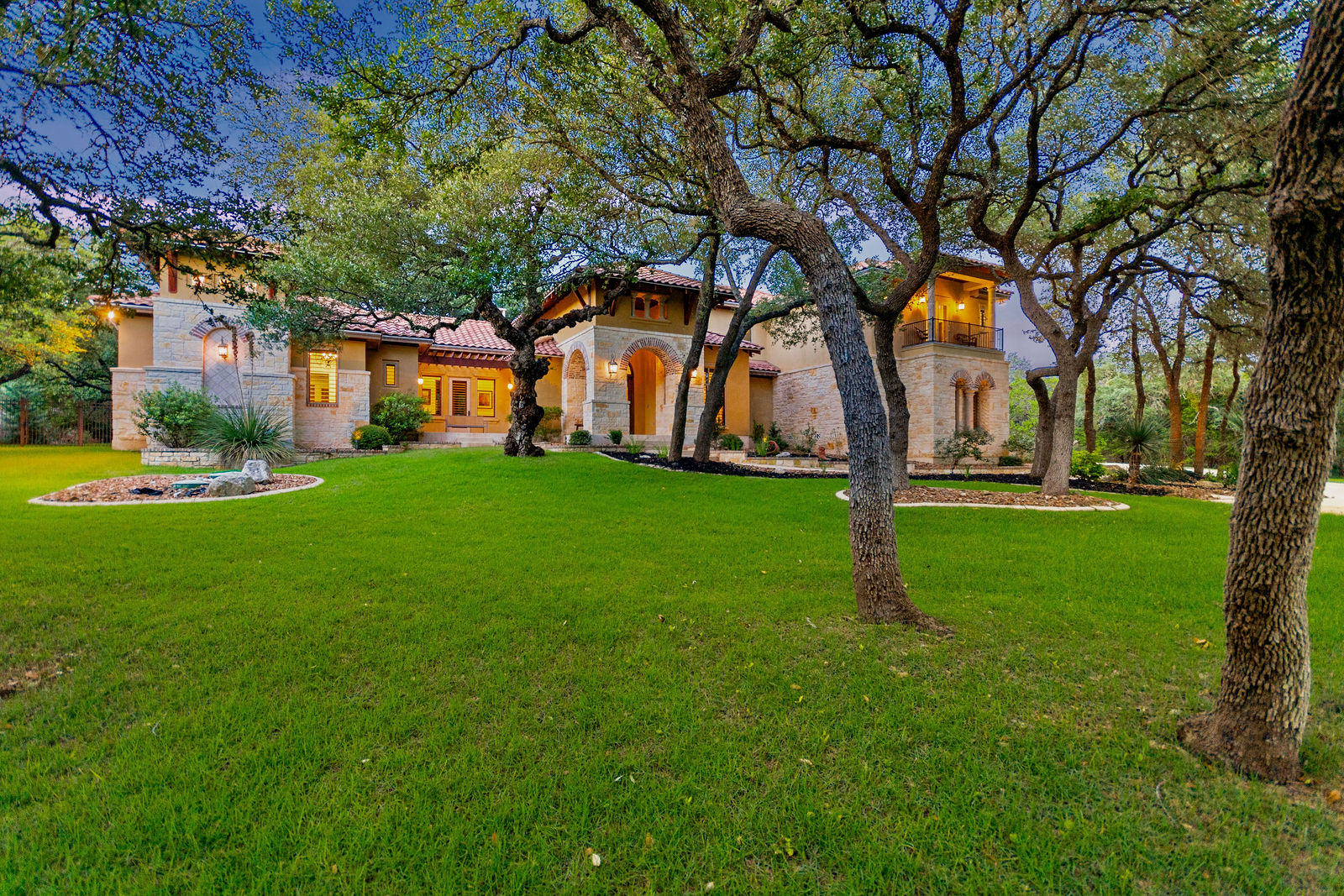 Resort-style pool and oak-shaded outdoor living at 40 Ranch Terrace in Fair Oaks Ranch, Texas