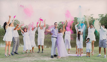 Smoke-bomb couple portrait at Queen's Park Savannah by Karimah Clinton Media