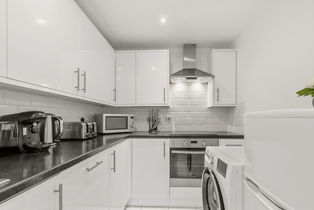 Clean kitchen detail with premium guest appliances