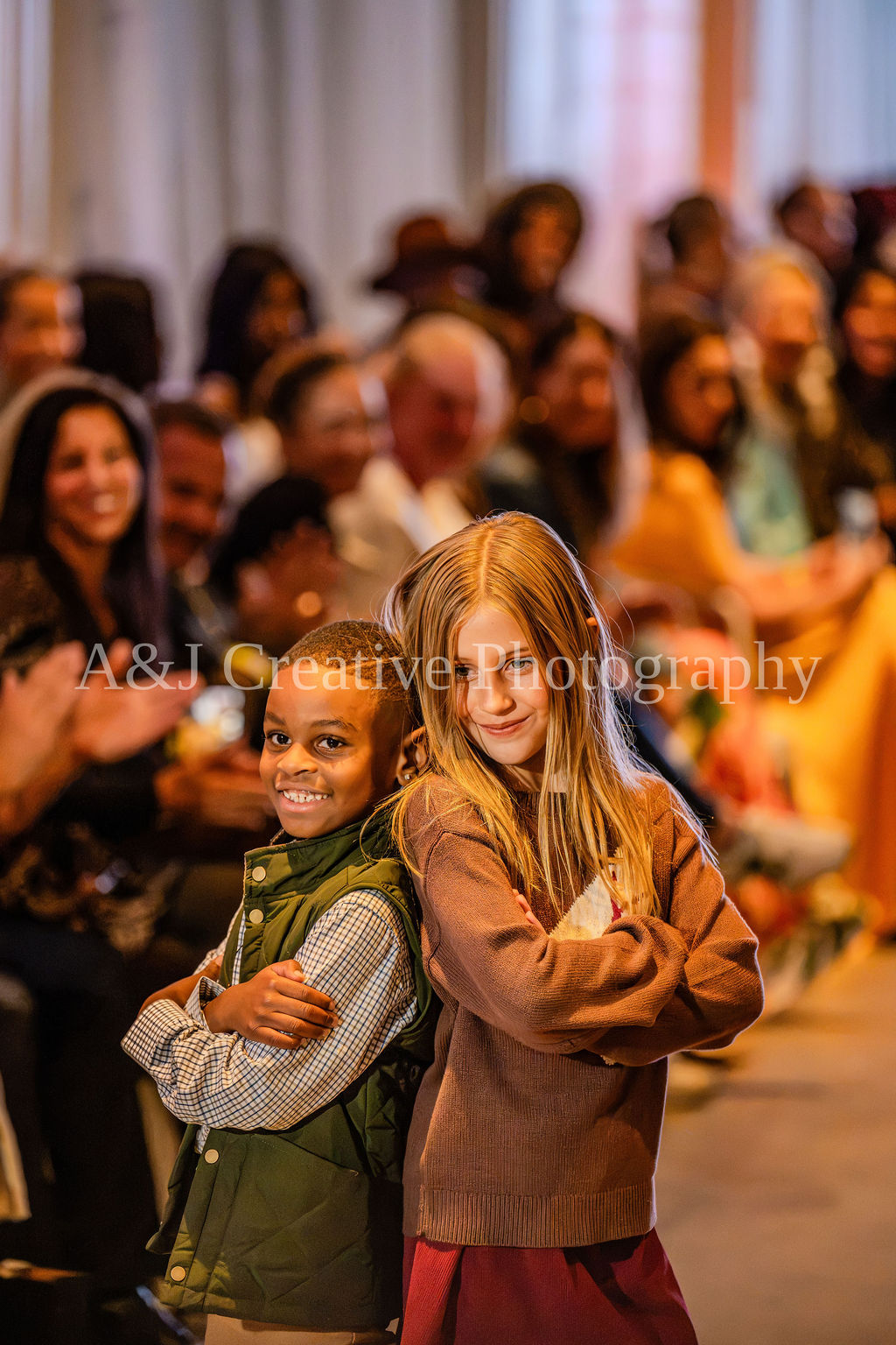 Fashion Week attendee with other guests in the background