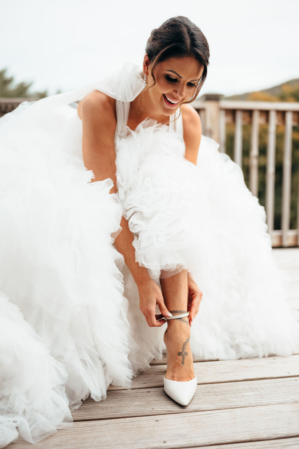 Heather slipping on her wedding shoes