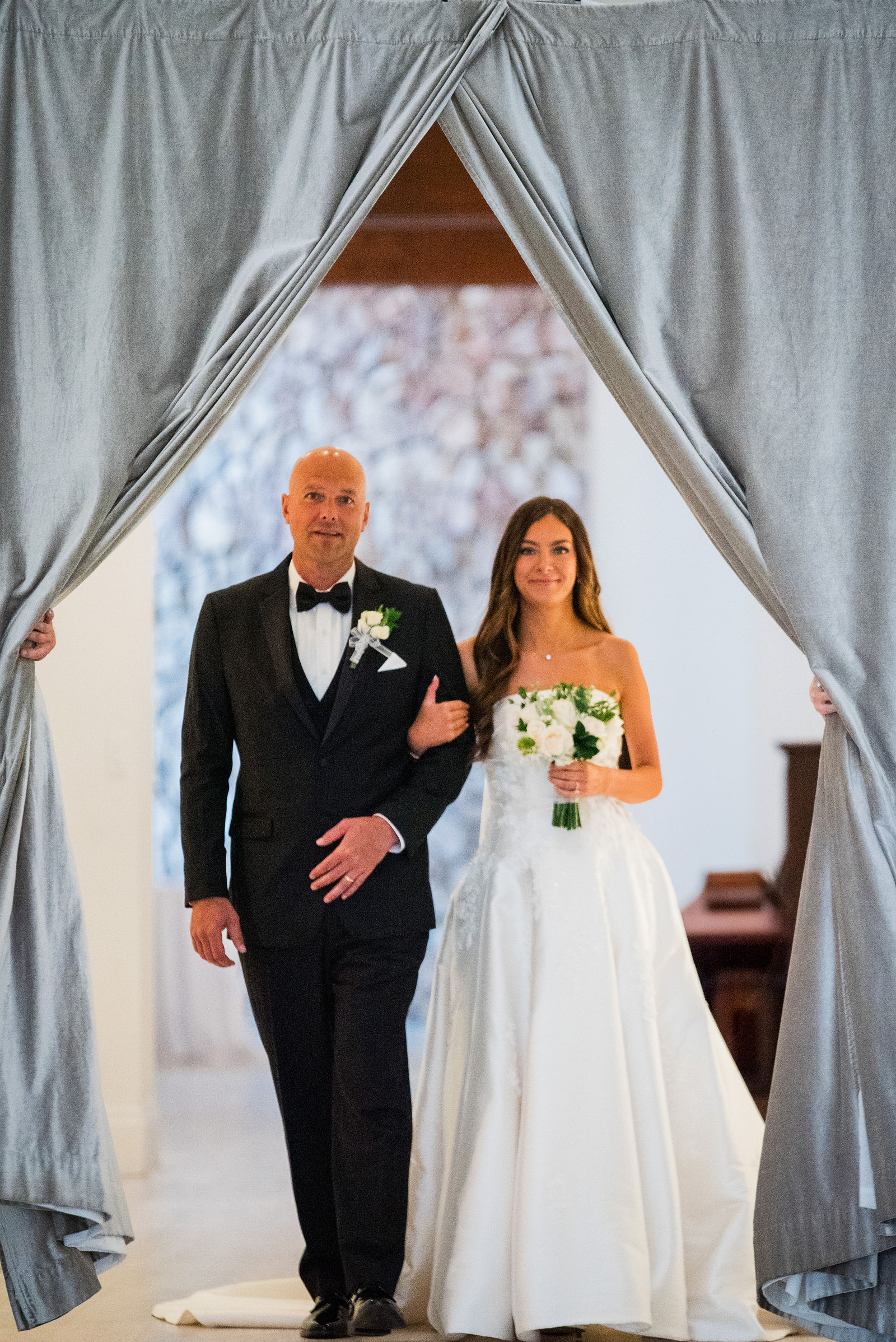 Bride and her father in the doorway before the aisle at The Oaks at Plum Creek
