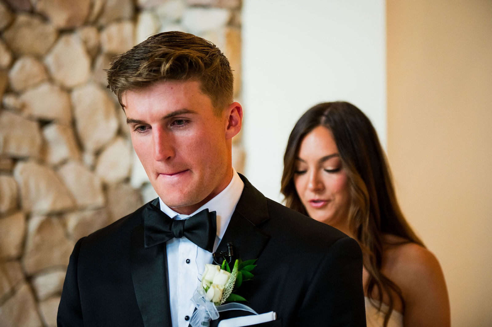 Bride and groom during their first touch before a Castle Rock Colorado wedding