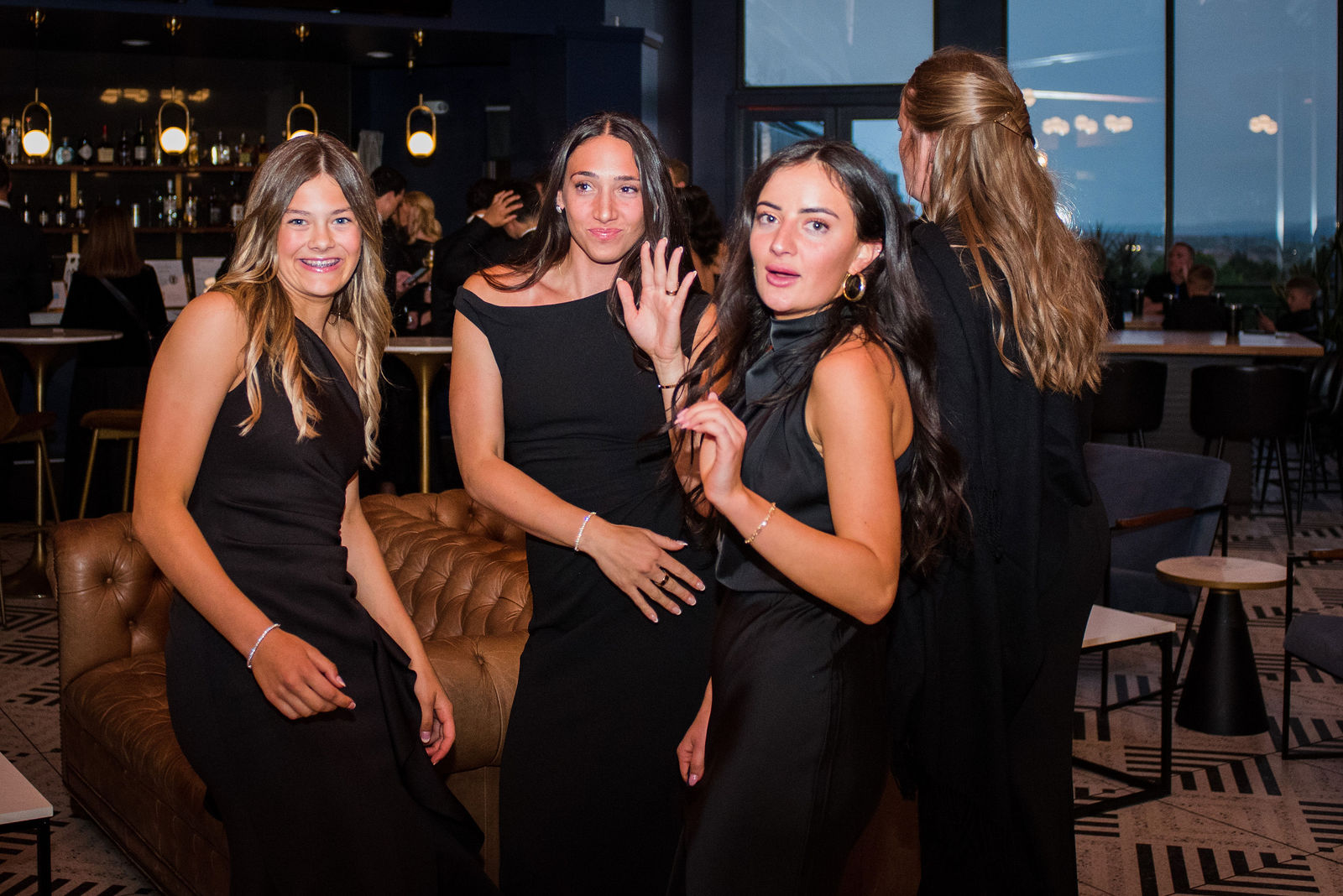 Bridesmaids on the dance floor at a black tie Castle Rock Colorado wedding