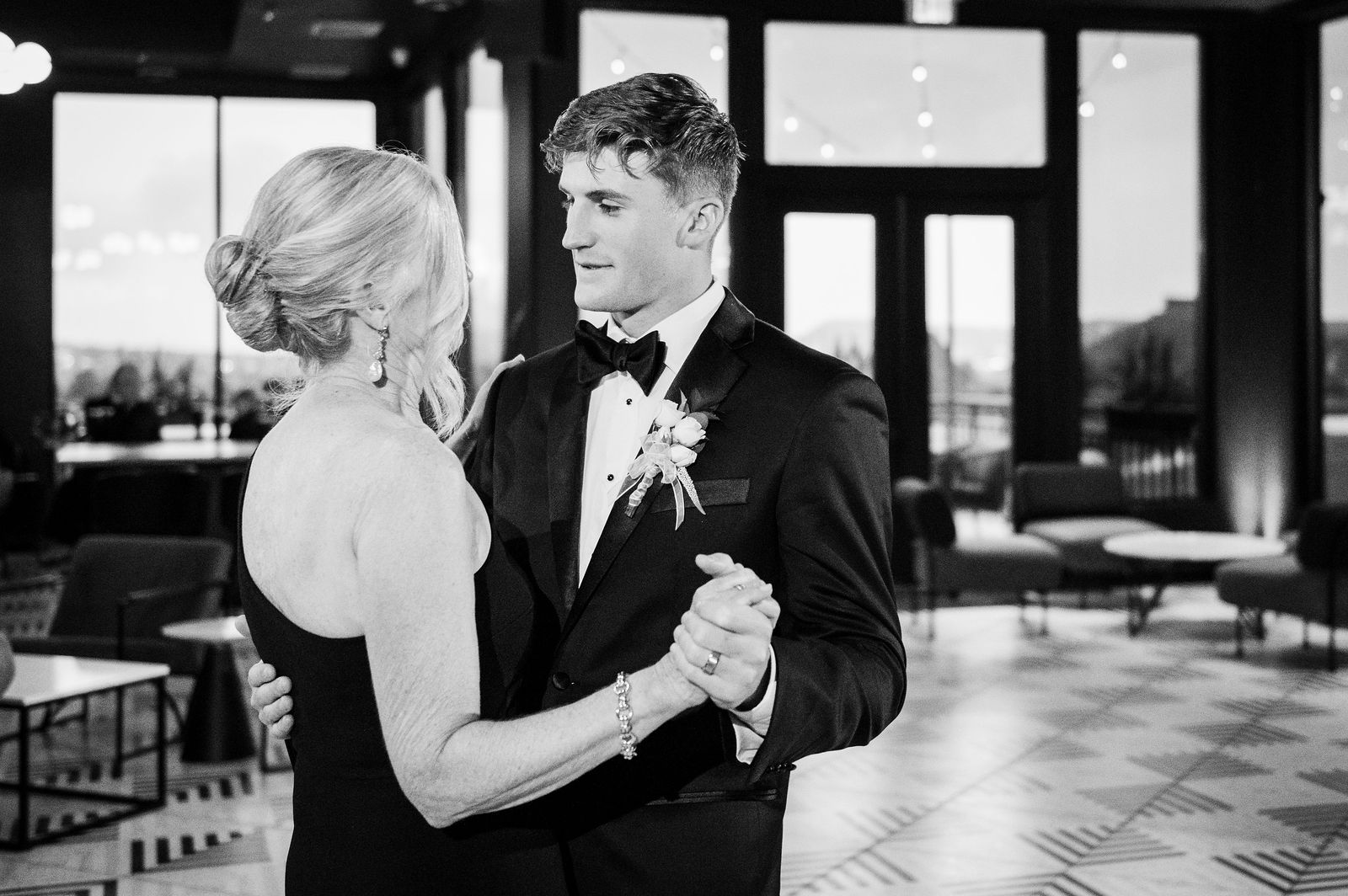 Groom dancing with his mother at The Oaks at Plum Creek