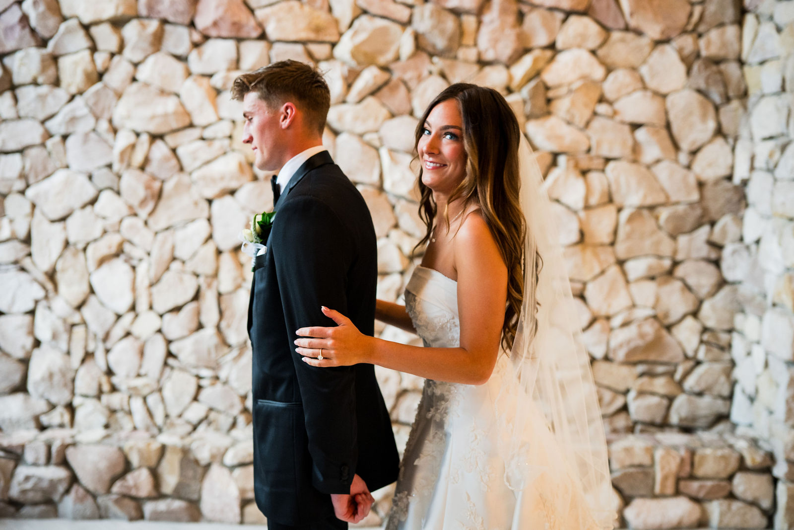 Bride and groom embracing after their private vows in Castle Rock Colorado