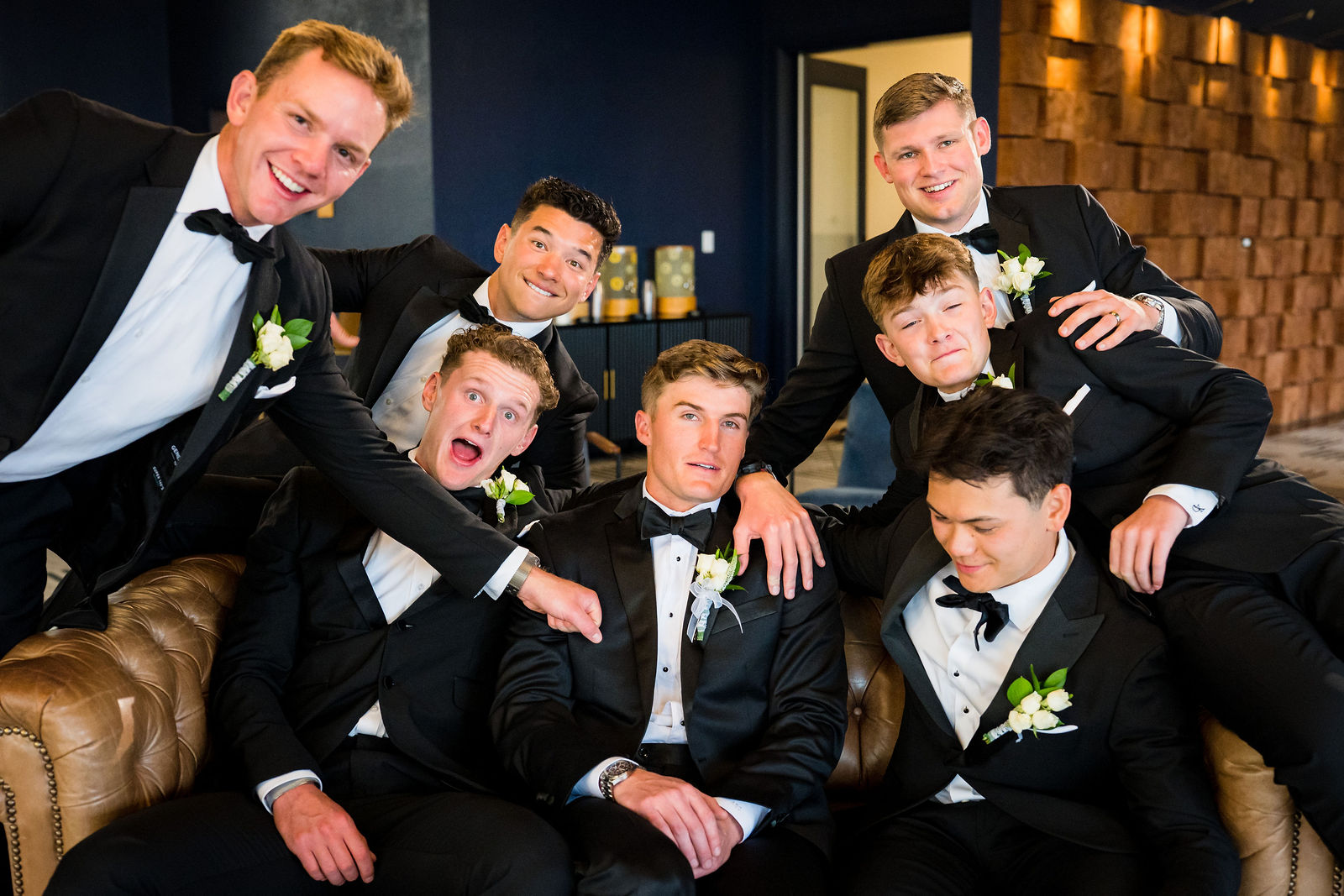 Groomsmen in the Art Deco lounge at The Oaks at Plum Creek