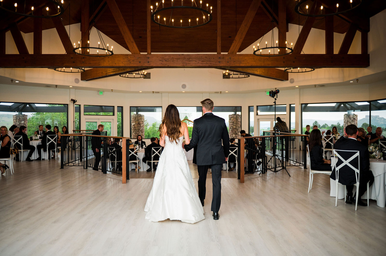 Grand entrance into the reception at The Oaks at Plum Creek Castle Rock Colorado