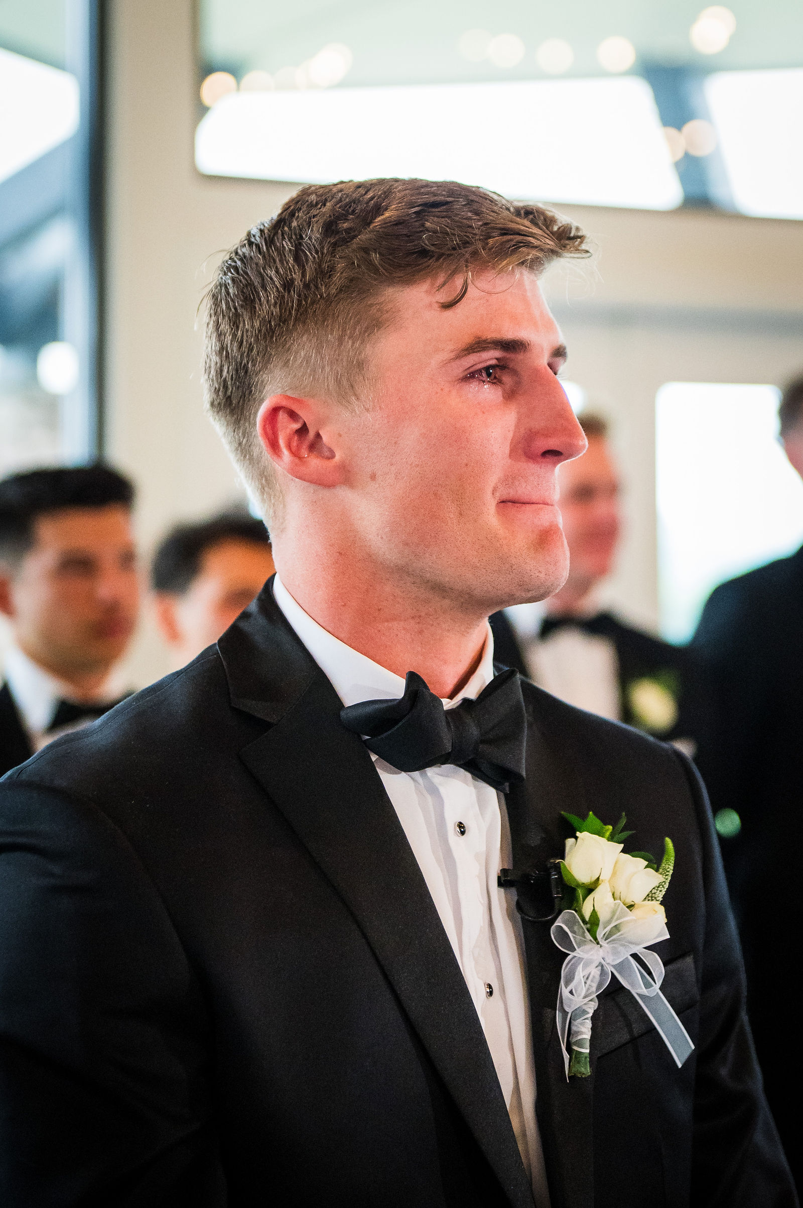 Groom crying as his bride walks down the aisle in Castle Rock Colorado
