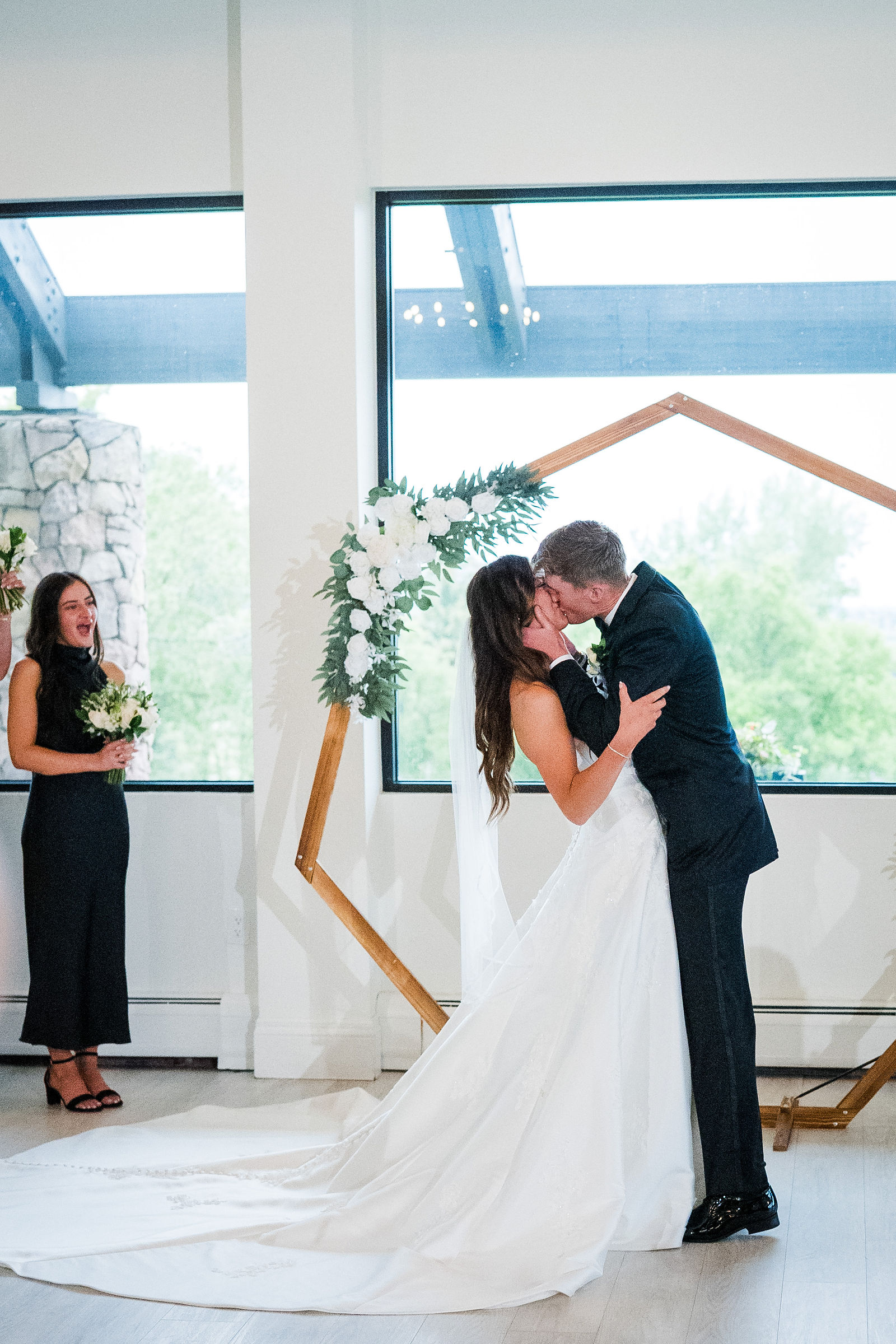 First kiss as a married couple at The Oaks at Plum Creek Castle Rock Colorado