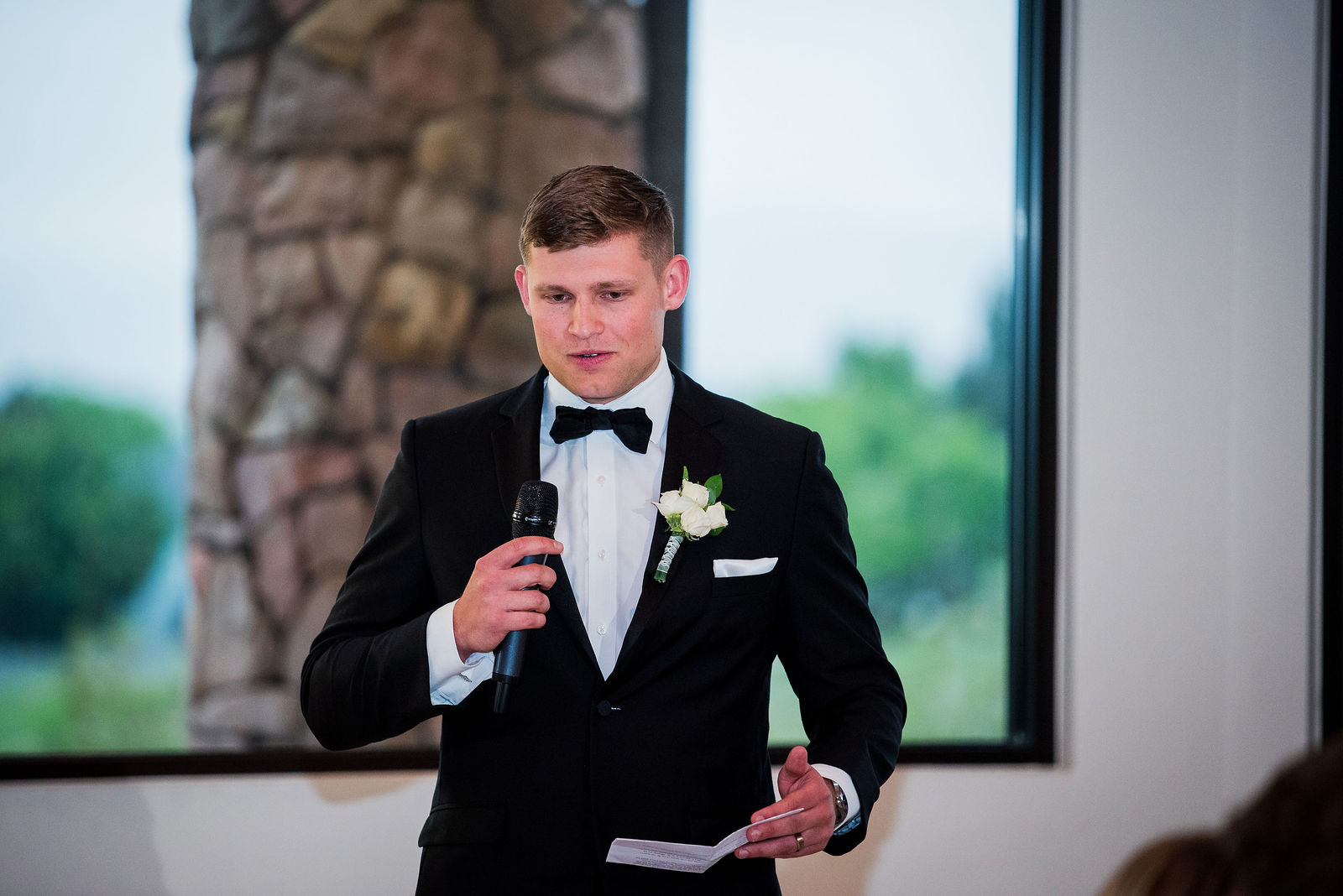 Groom giving a wedding speech at The Oaks at Plum Creek