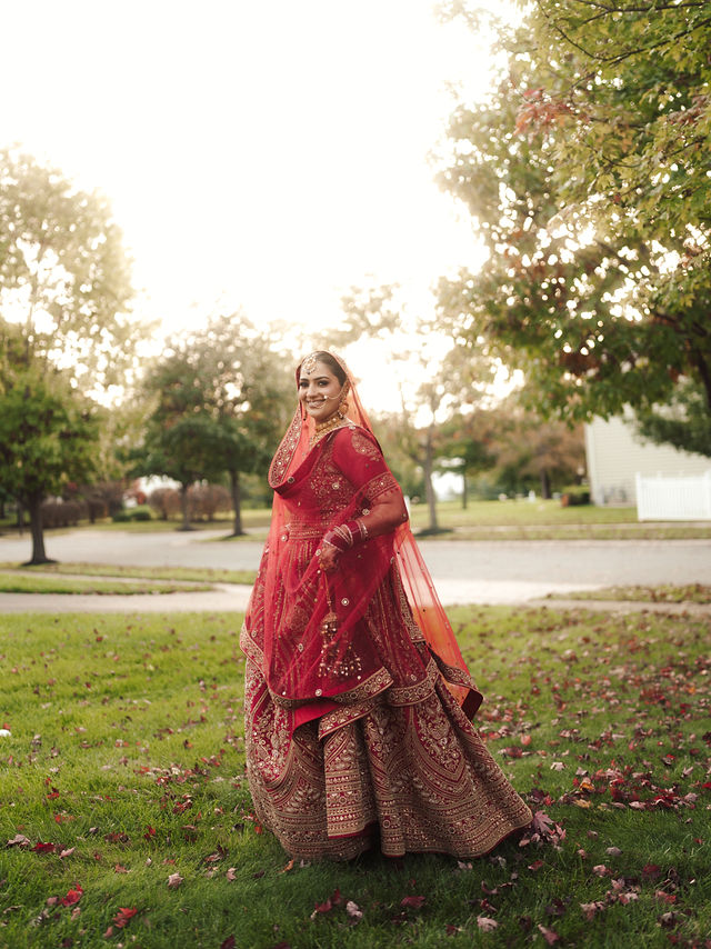 Avneet looking back in a sunlit outdoor bridal portrait
