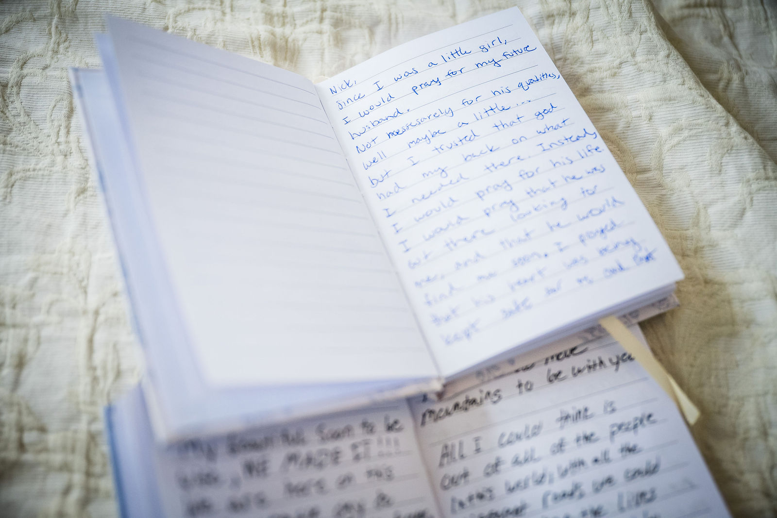 Handwritten wedding vows filling both pages of a bride’s vow book