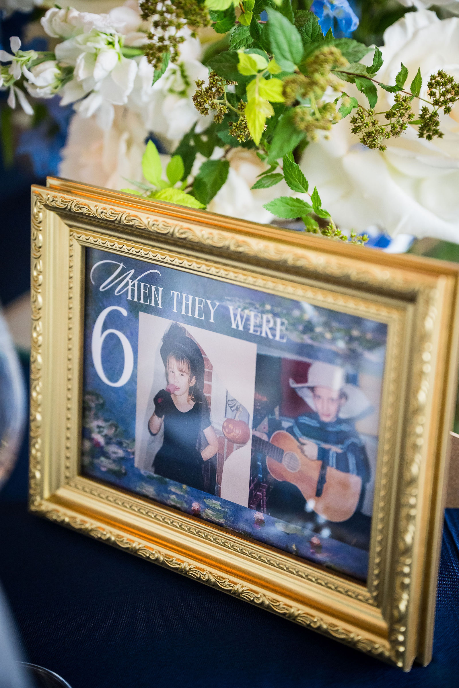 When they were table number with childhood photos of the guests
