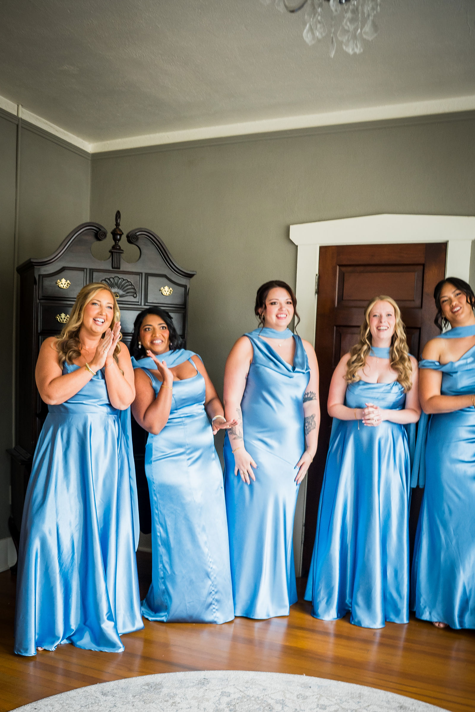 Bridesmaids turning around for their first look with the bride