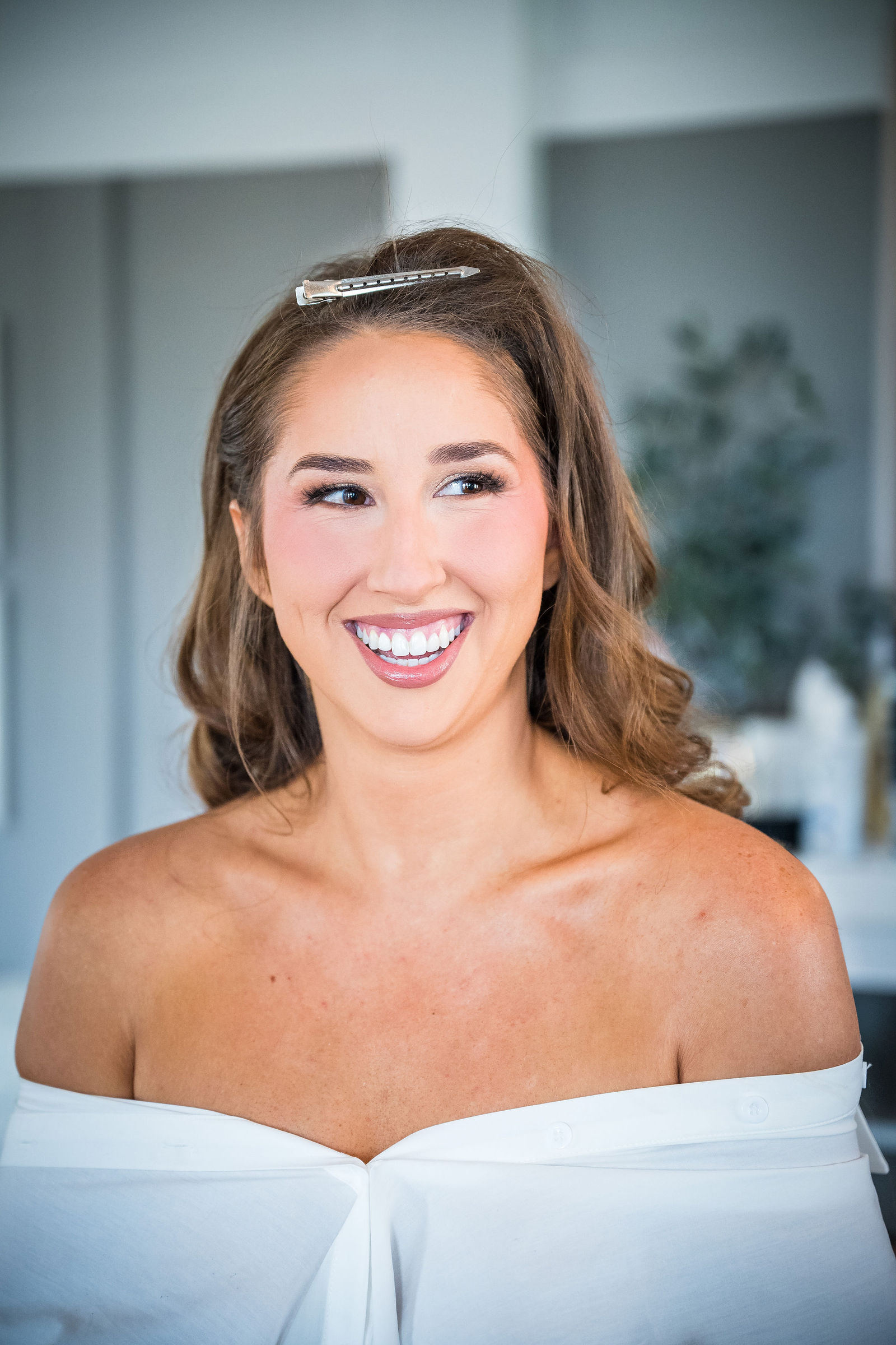 Bride laughing in the getting ready house before a Colorado wedding