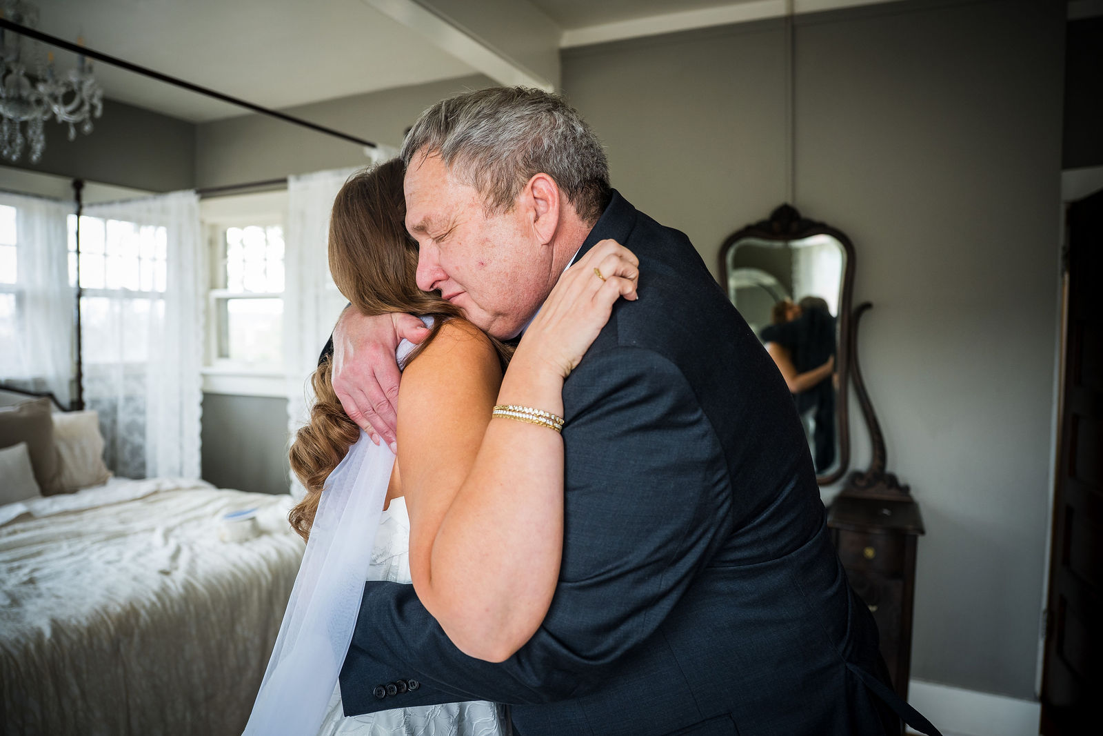 Father of the bride overcome seeing his daughter in her wedding dress