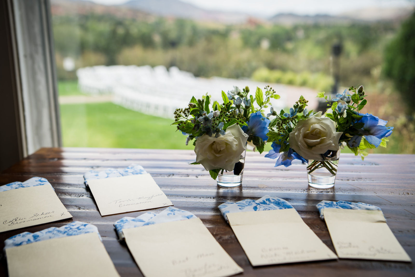 Wedding detail table with blue and white florals at the Manor House