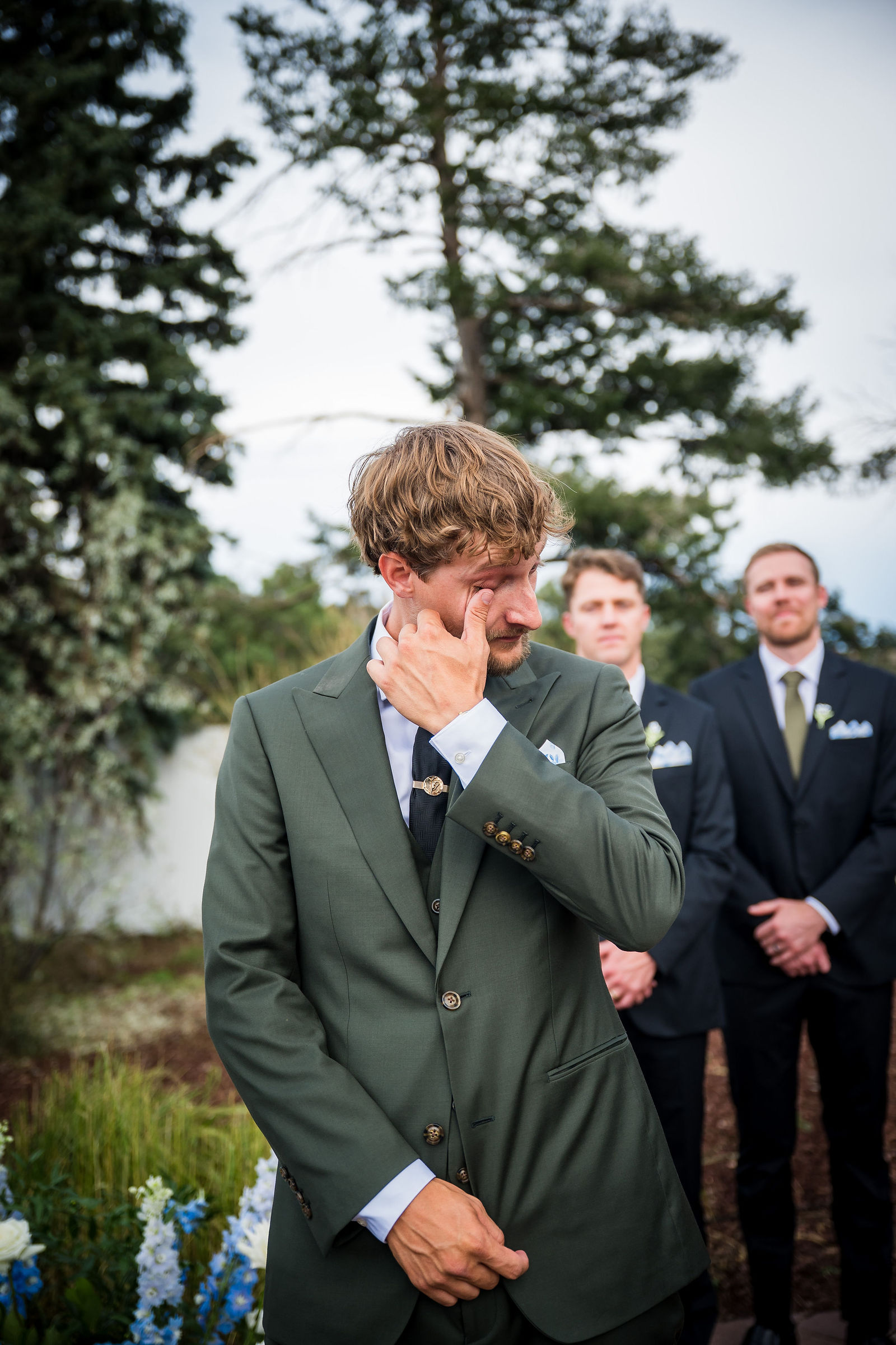 Groom overcome watching his bride walk down the aisle