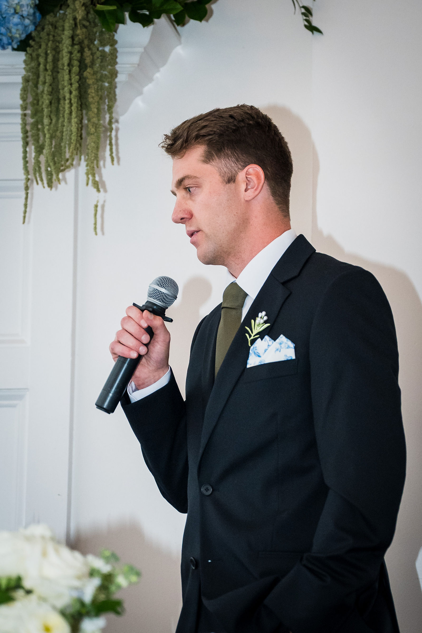 Best man giving a toast at a Manor House wedding reception
