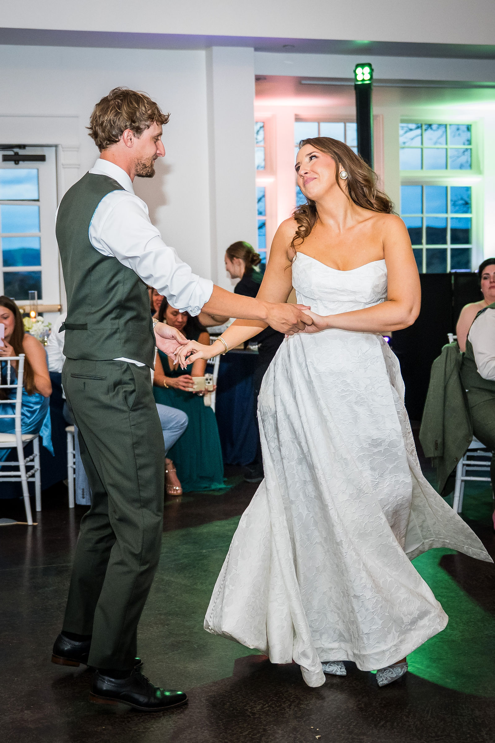 Bride and groom during their first dance at the Manor House